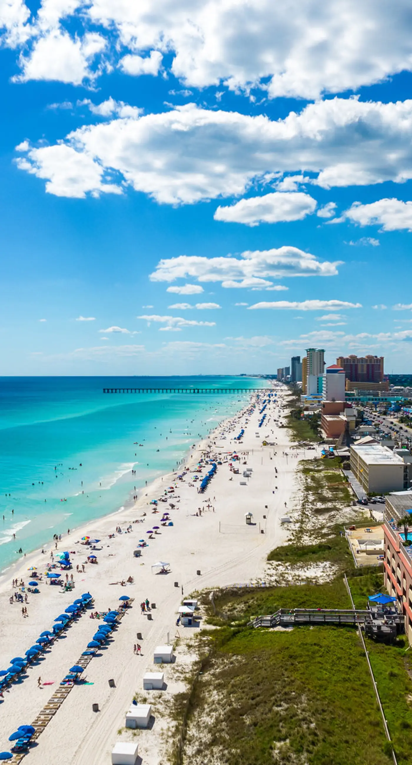 Gulf-view condo with beach service, pools, hot tubs & gym