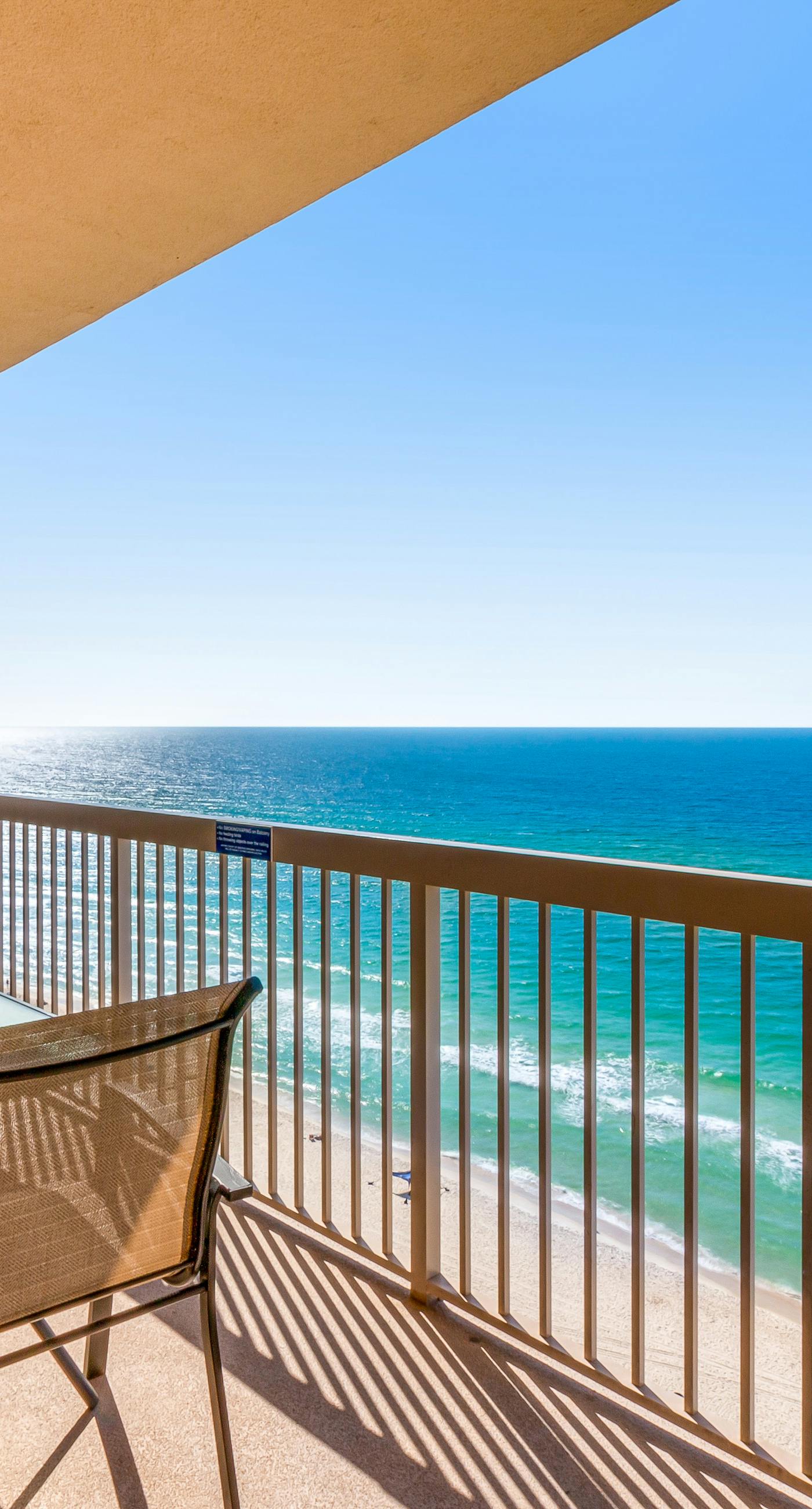 Stunning Gulf-front condo with balcony, pool, hot tub, gym & beach views