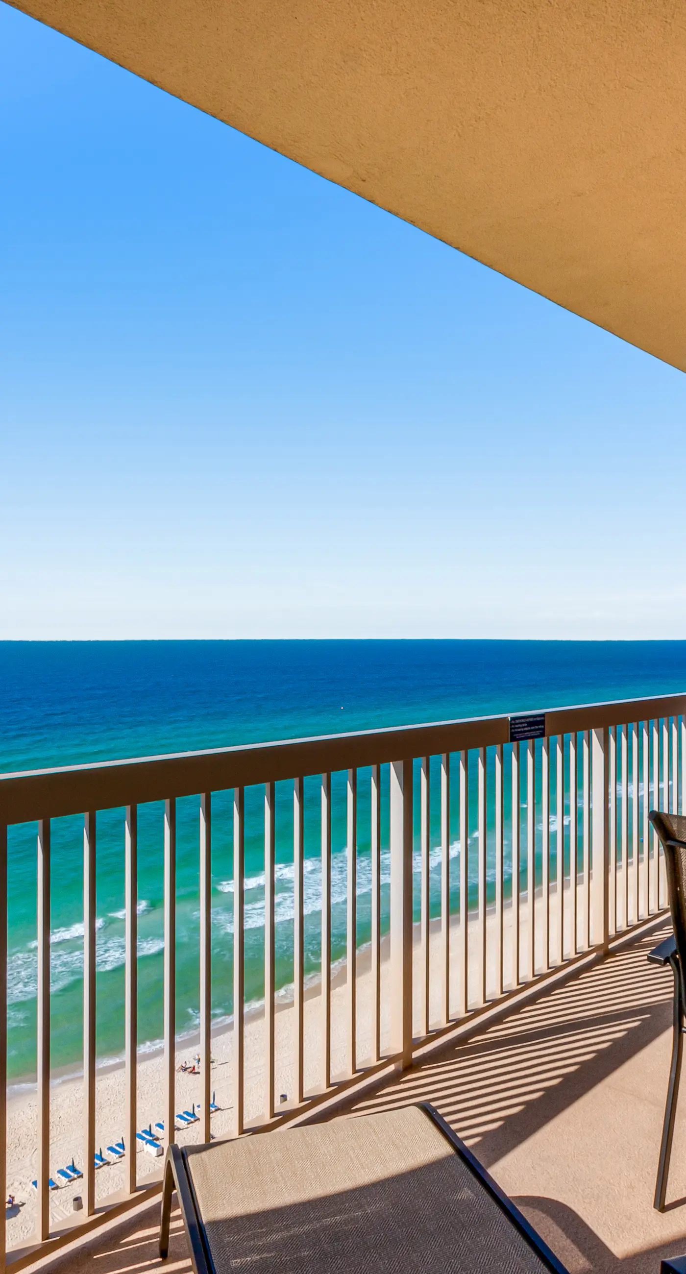 Stunning Gulf-front condo with balcony, pool, hot tub, gym & beach views