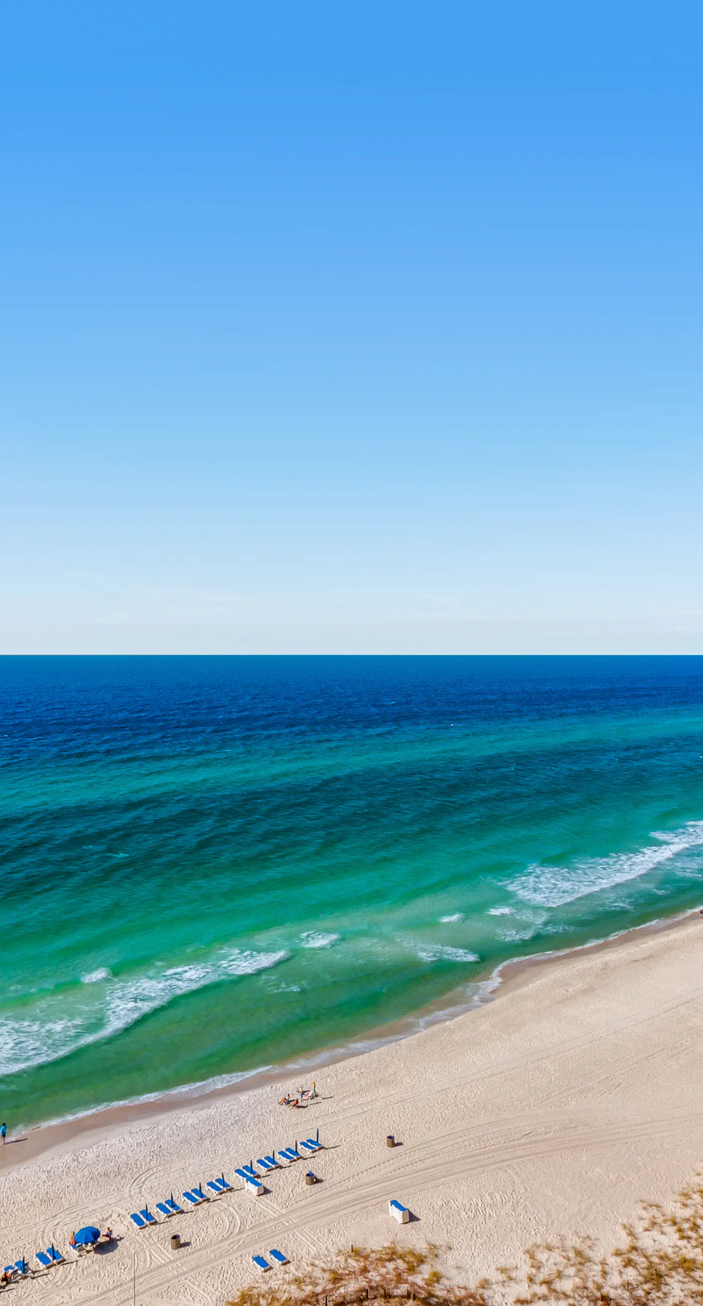 Stunning Gulf-front condo with balcony, pool, hot tub, gym & beach views