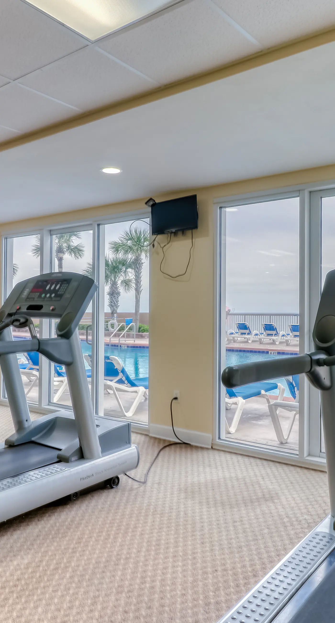 Stunning Gulf-front condo with balcony, pool, hot tub, gym & beach views