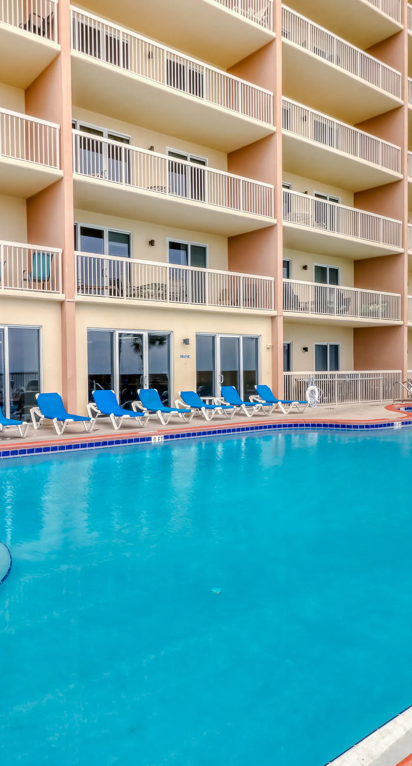 Stunning Gulf-front condo with balcony, pool, hot tub, gym & beach views