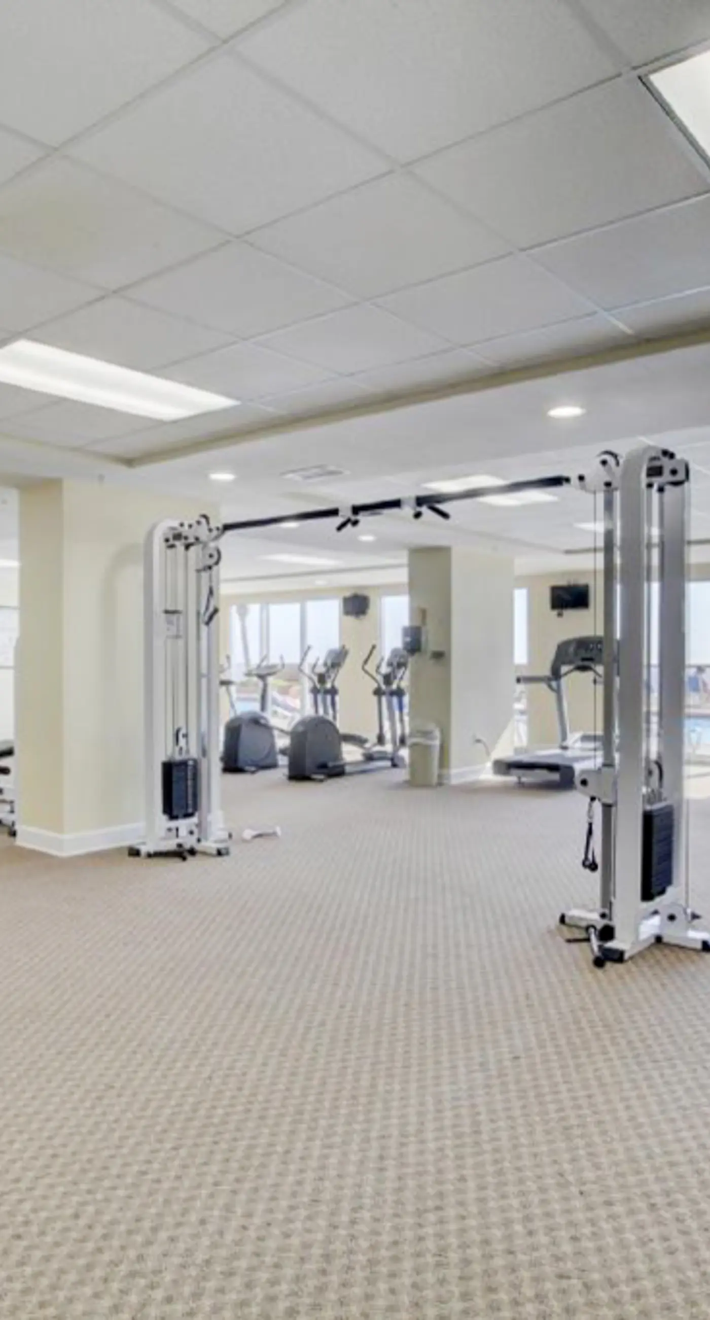 Stunning Gulf-front condo with balcony, pool, hot tub, gym & beach views