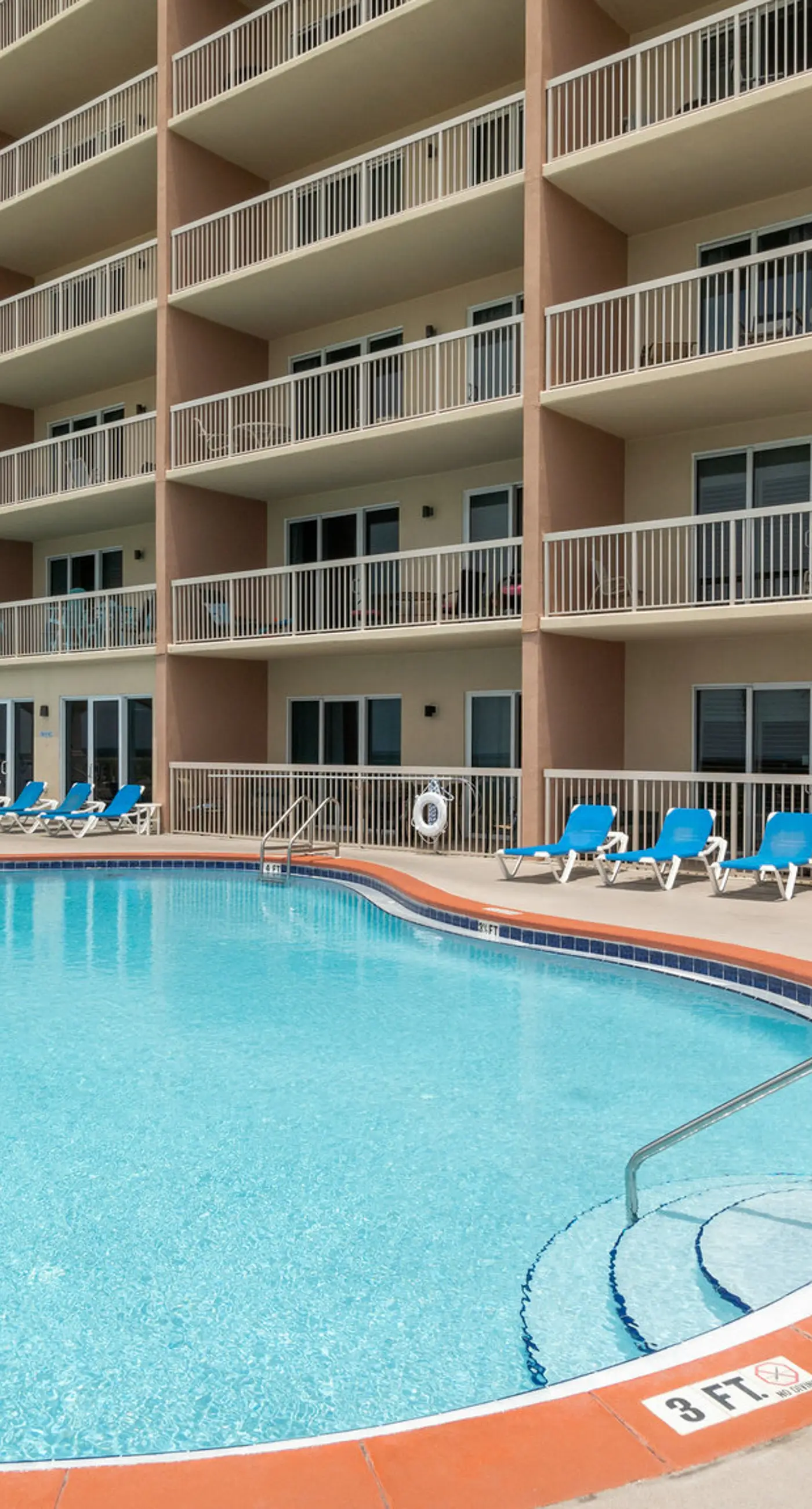 Stunning Gulf-front condo with balcony, pool, hot tub, gym & beach views