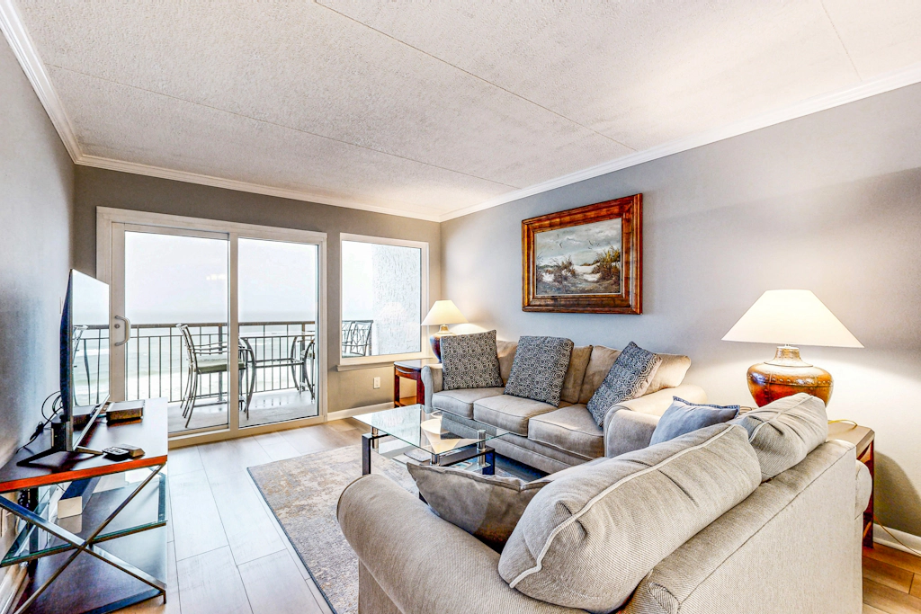 Beachfront condo with Gulf-view balcony, central AC, pool, & tennis