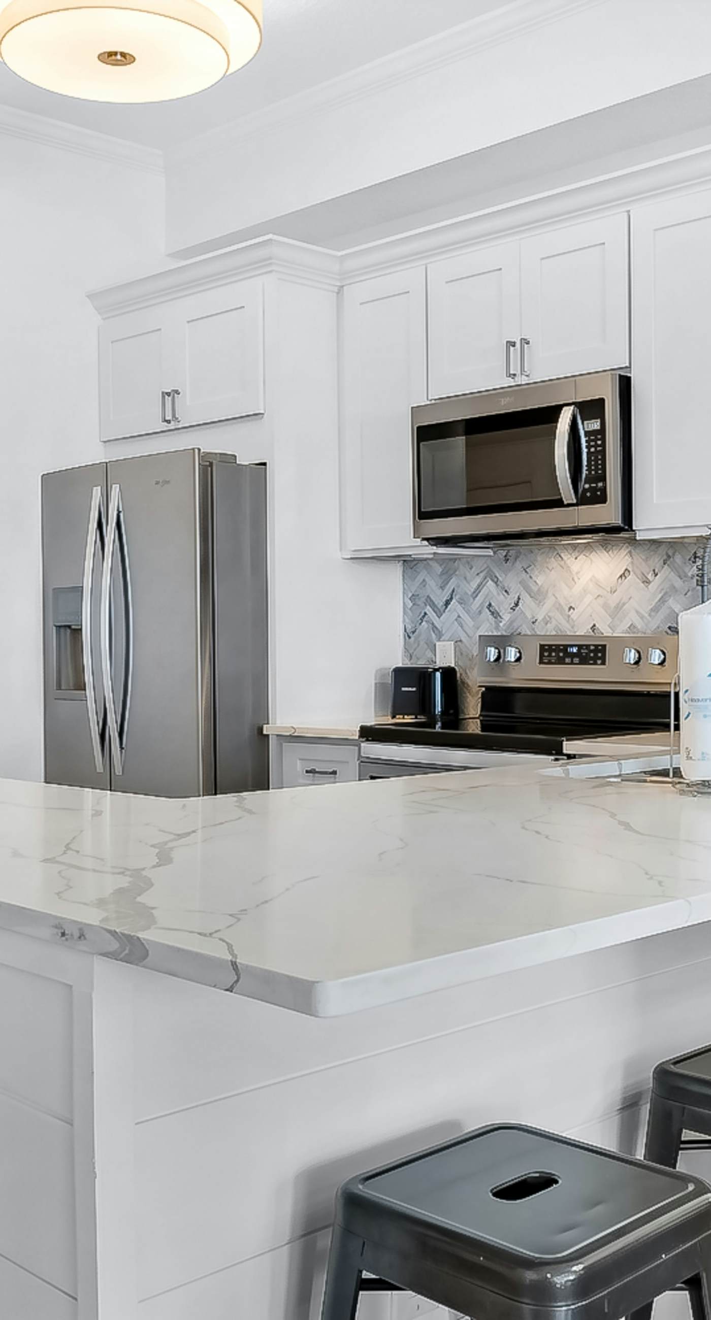 Completely Updated with beach access, pool, hot tub, tennis, pickleball & gym