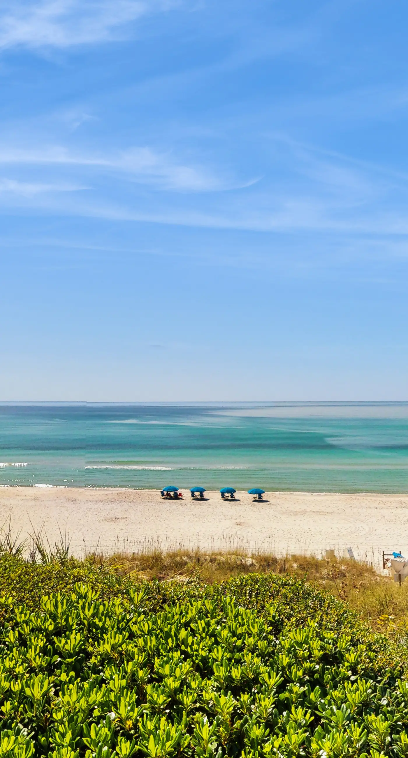 Ideally located beachfront home with balcony, washer&dryer, AC, & amazing views