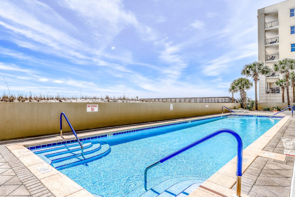 Oceanfront condo with pool, hot tub, central AC, washer/dryer, & fitness room
