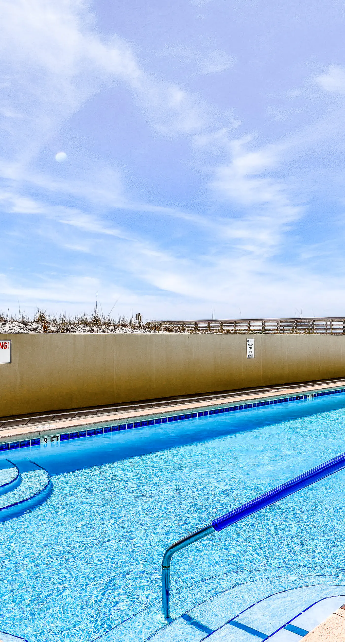 Pelican Isle 506- Oceanfront condo with pool, hot tub, central AC, washer/dryer, & fitness room