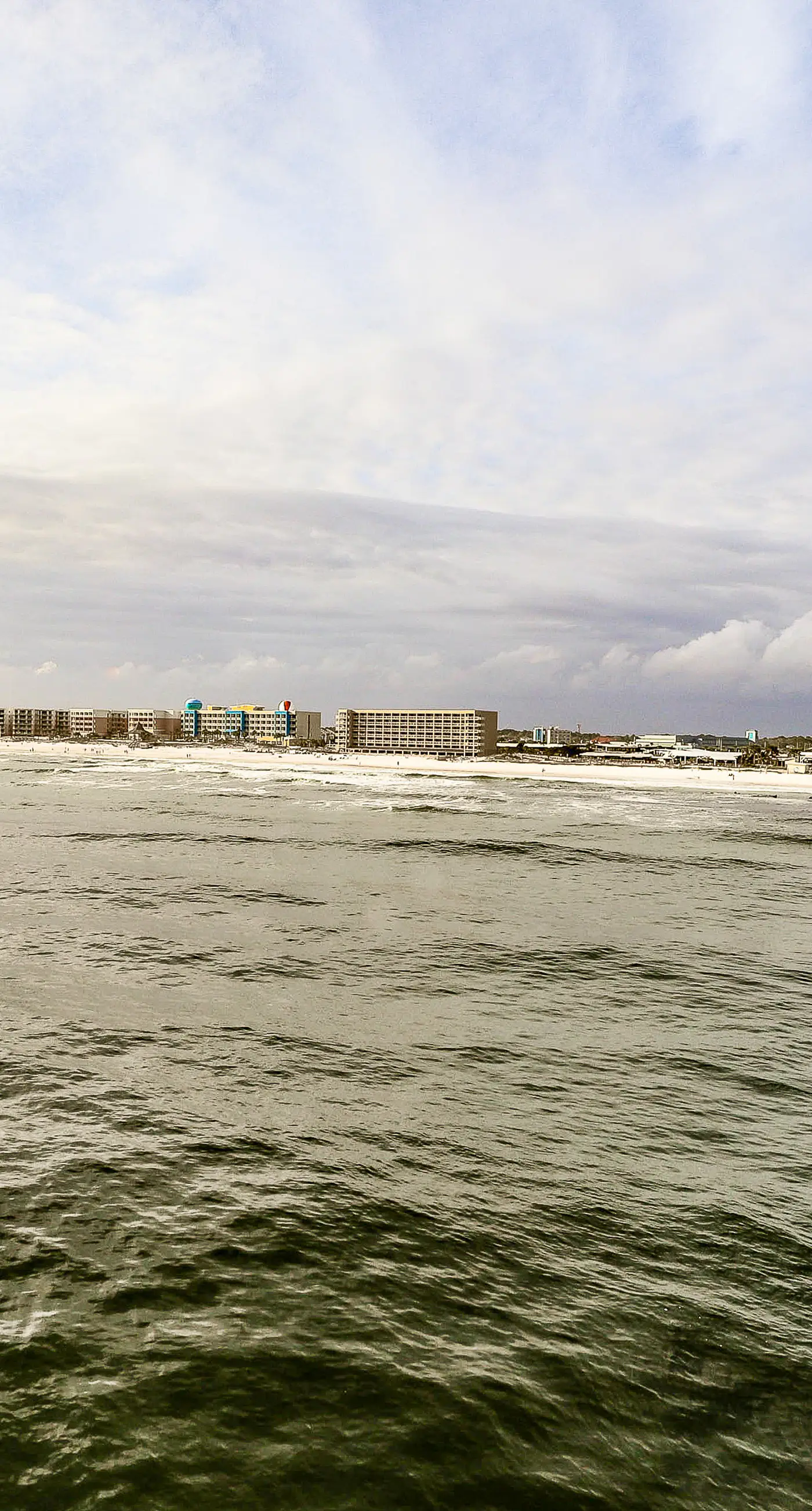 Pelican Isle 506- Oceanfront condo with pool, hot tub, central AC, washer/dryer, & fitness room