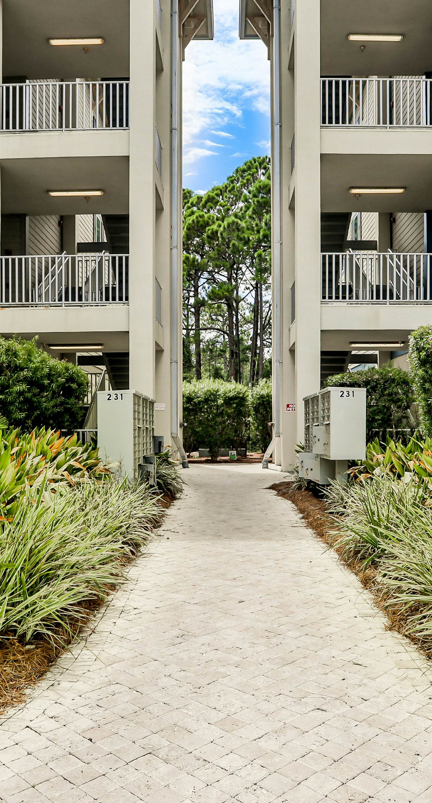 Updated Emerald Coast condo with pool, AC, & washer/dryer - walk to beach