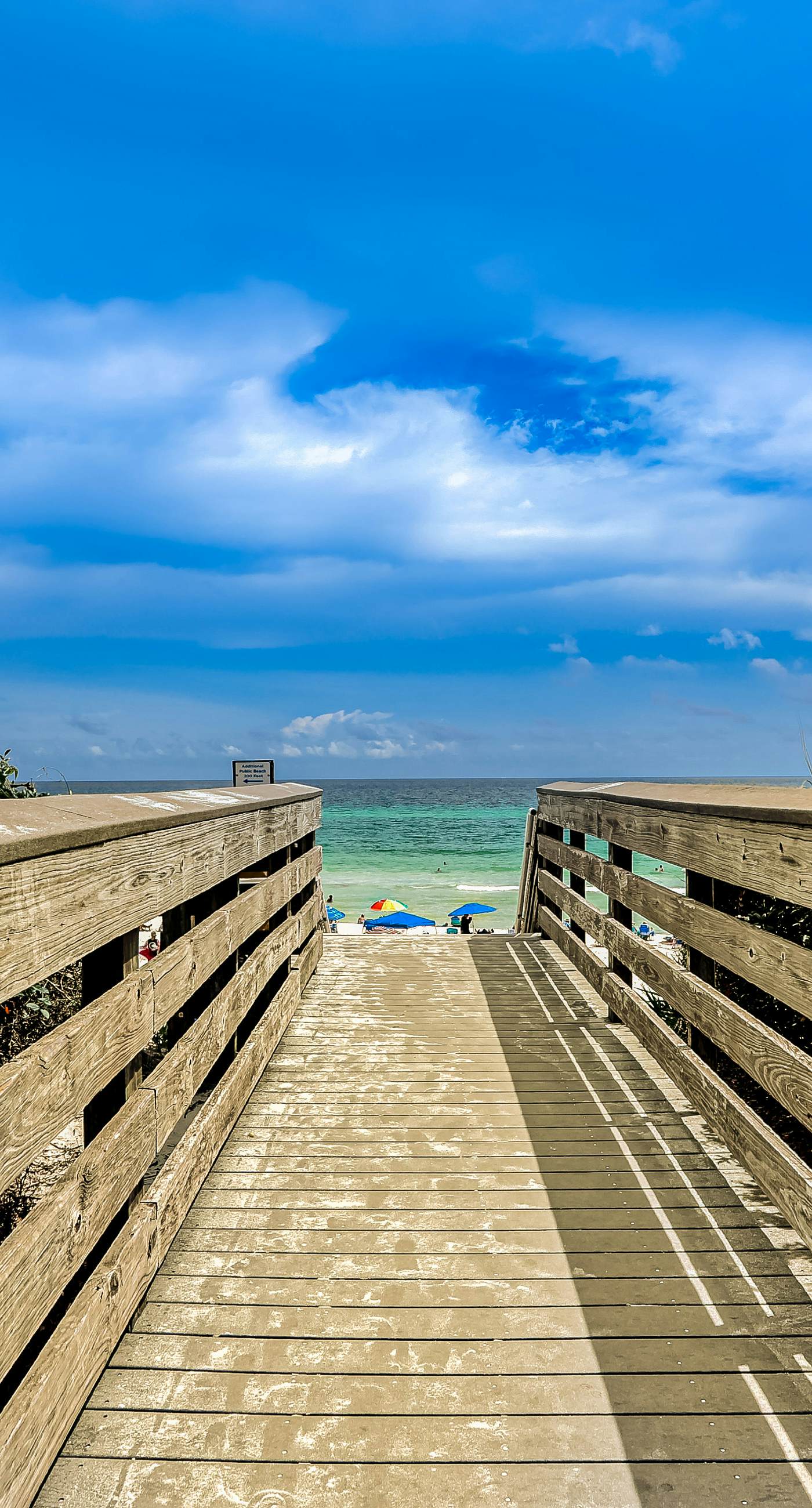 Updated Emerald Coast condo with pool, AC, & washer/dryer - walk to beach