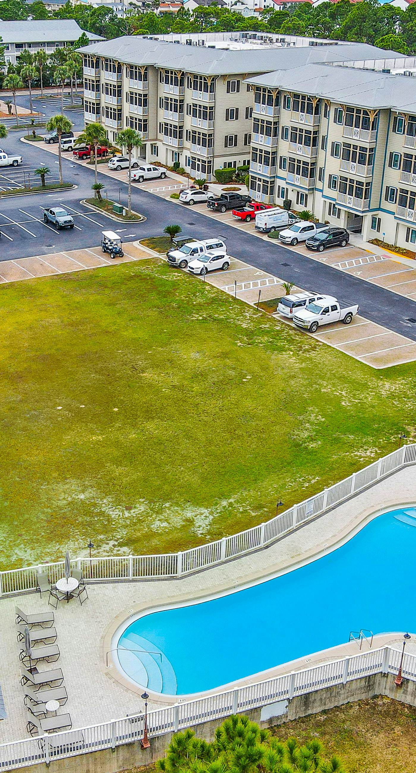 Updated Emerald Coast condo with pool, AC, & washer/dryer - walk to beach