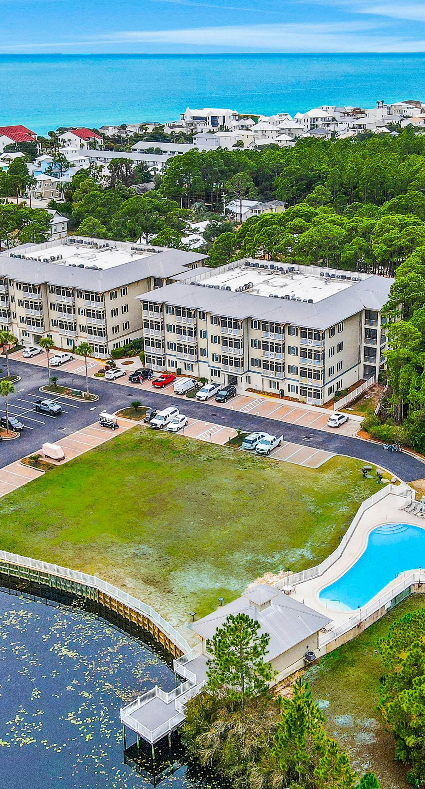 Updated Emerald Coast condo with pool, AC, & washer/dryer - walk to beach