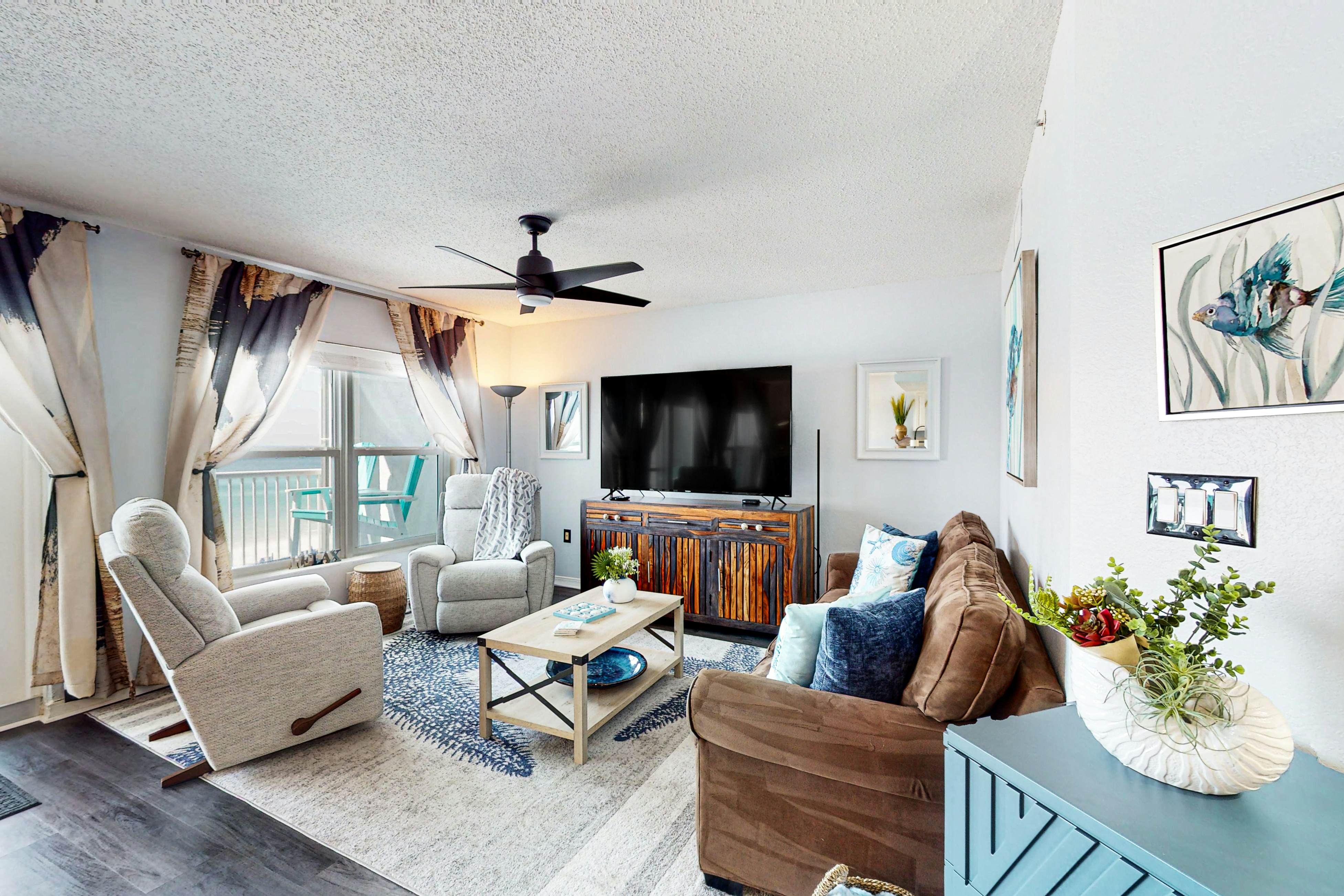 Beachfront condo with gulf views, pool, gym, & private balcony