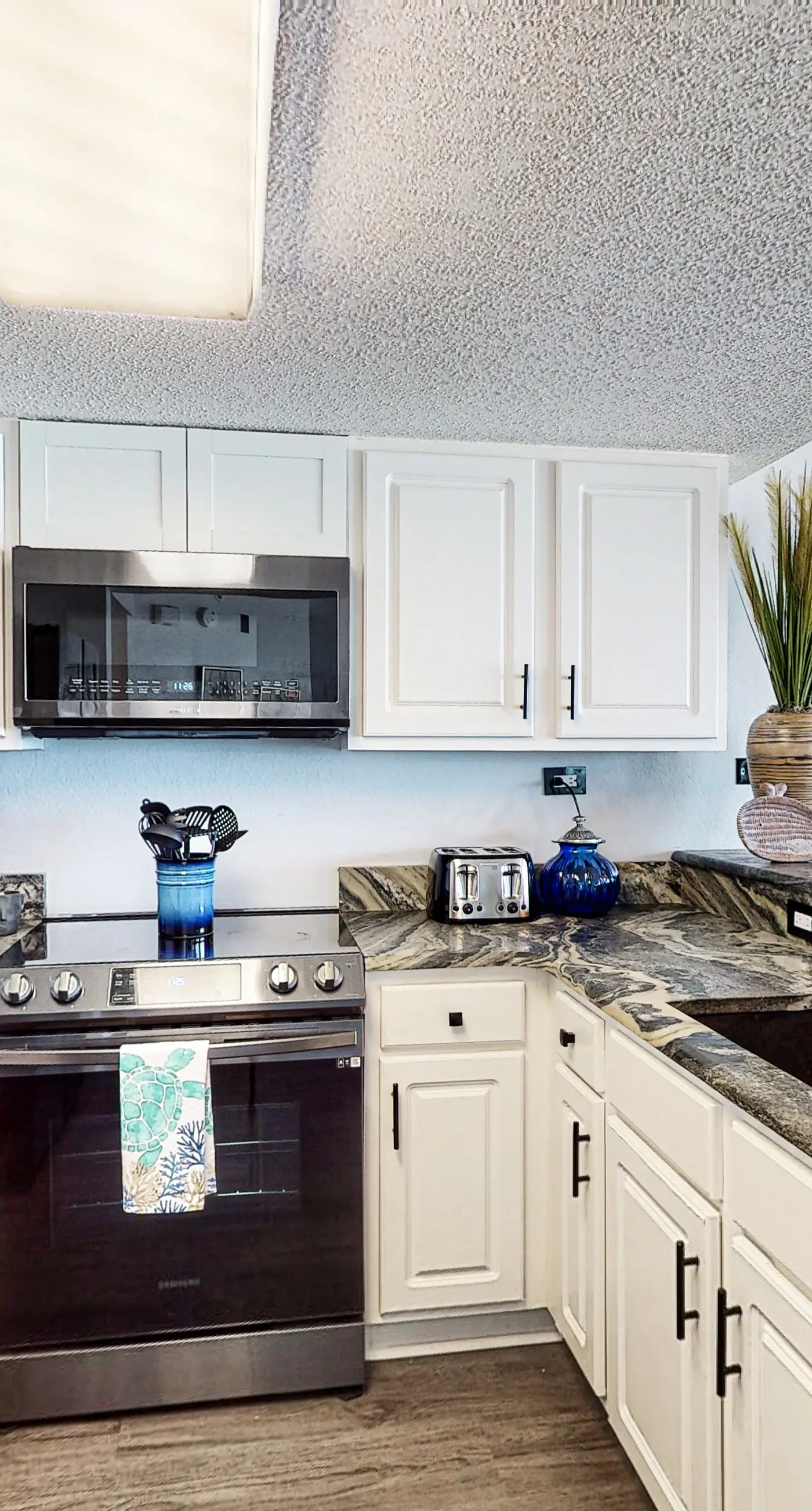 Beachfront condo with gulf views, pool, gym, & private balcony