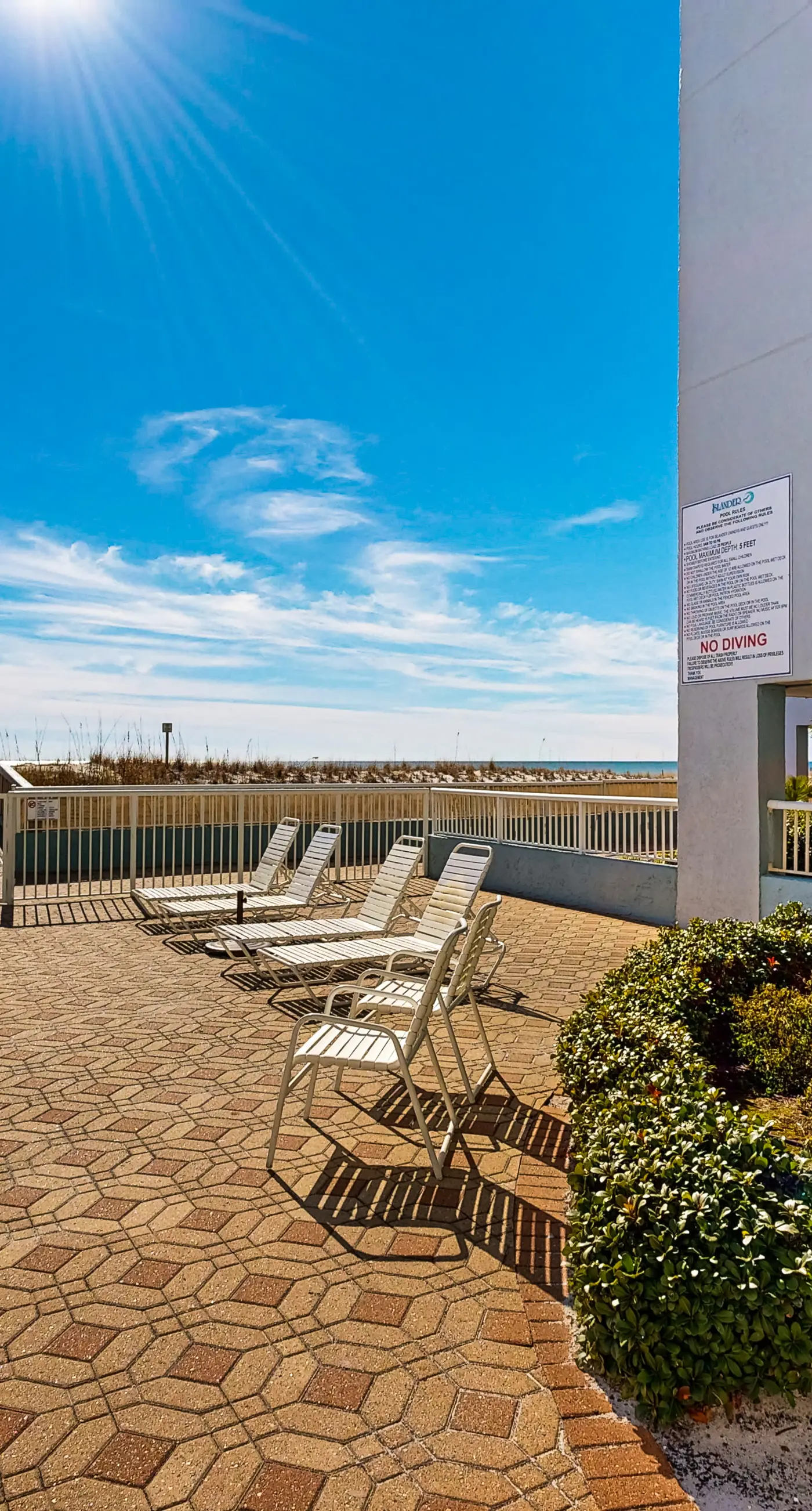 Beachfront condo with gulf views, pool, gym, & private balcony