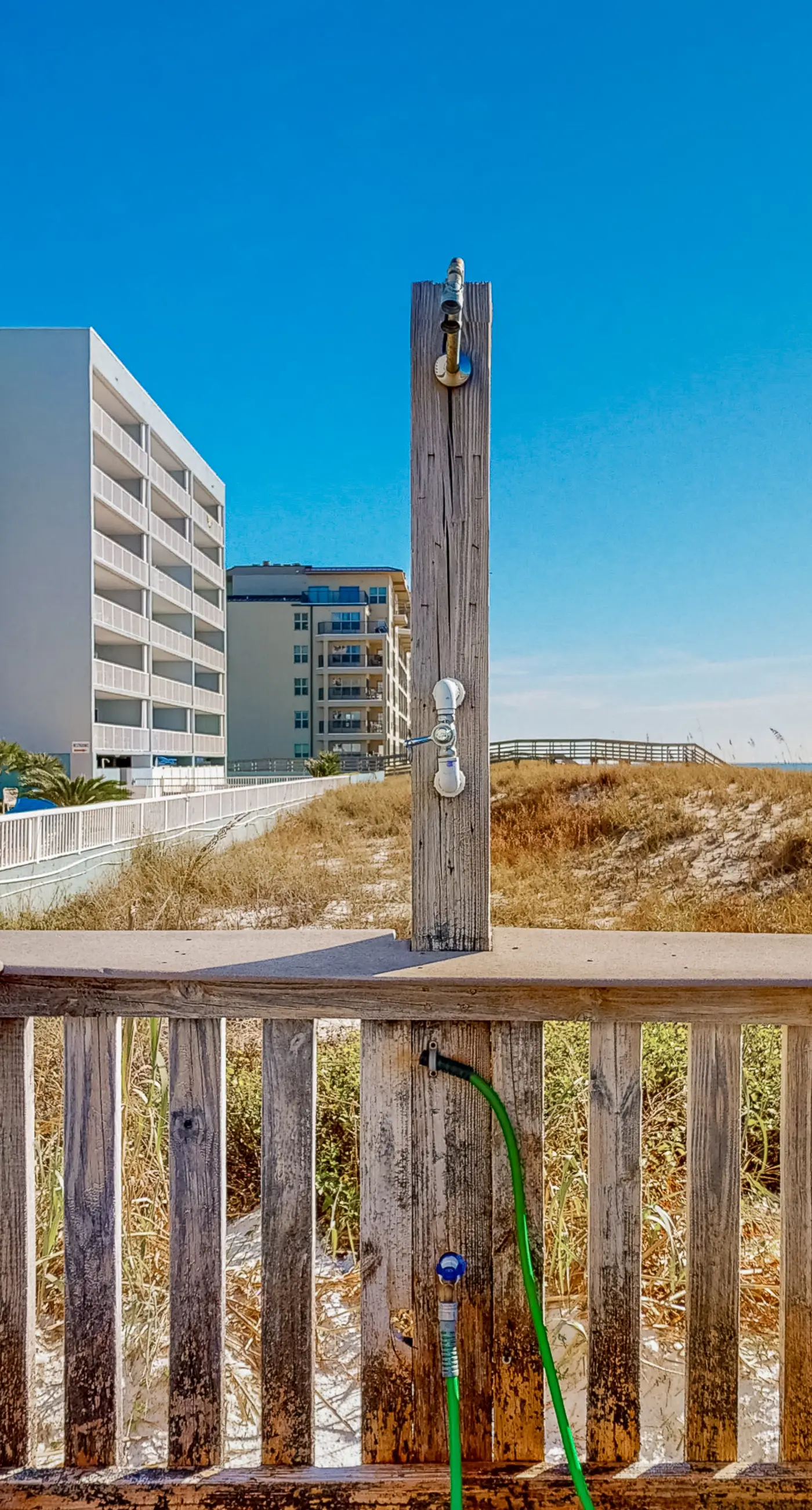 Beachfront condo with gulf views, pool, gym, & private balcony