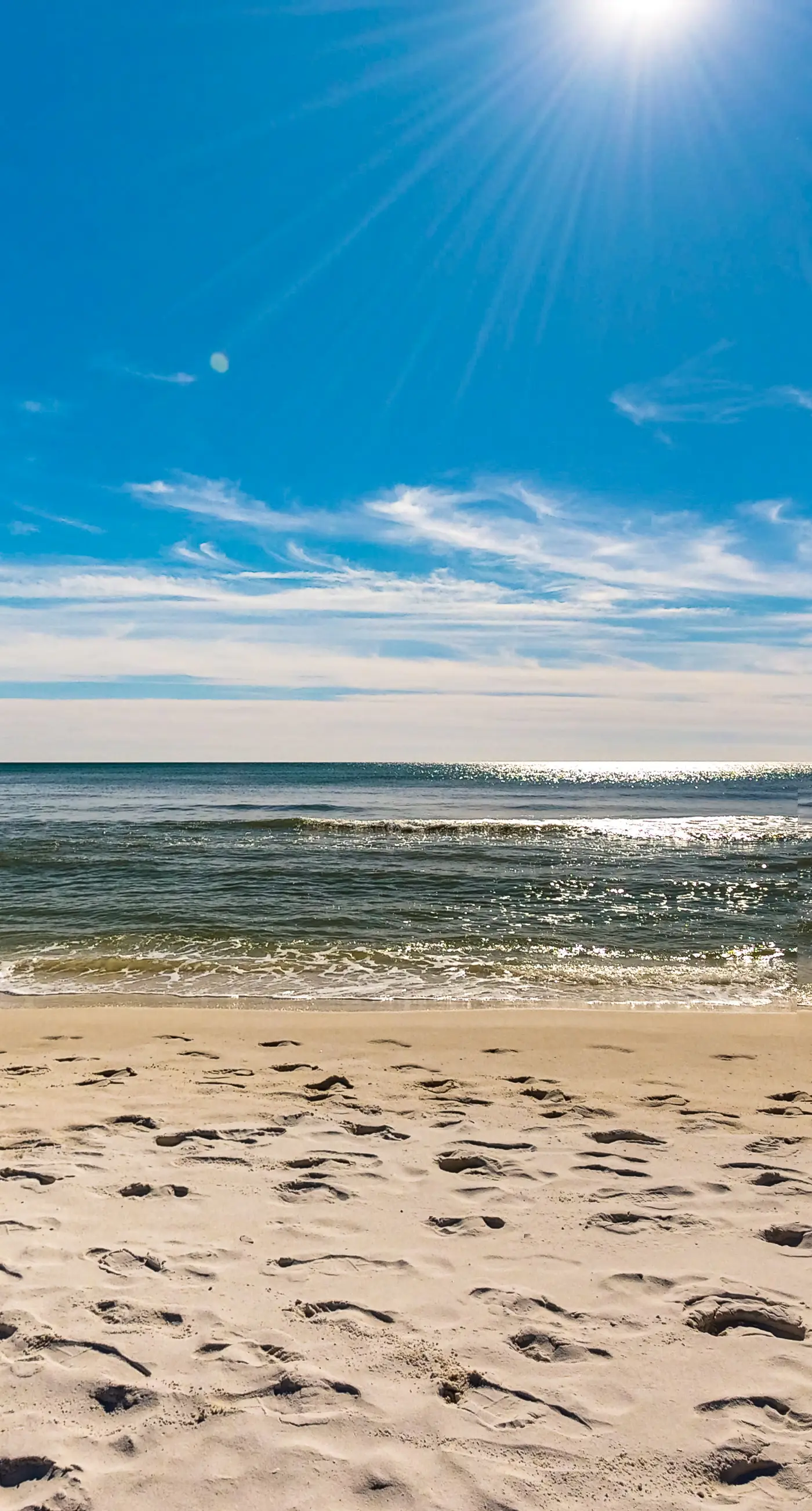 Beachfront condo with gulf views, pool, gym, & private balcony