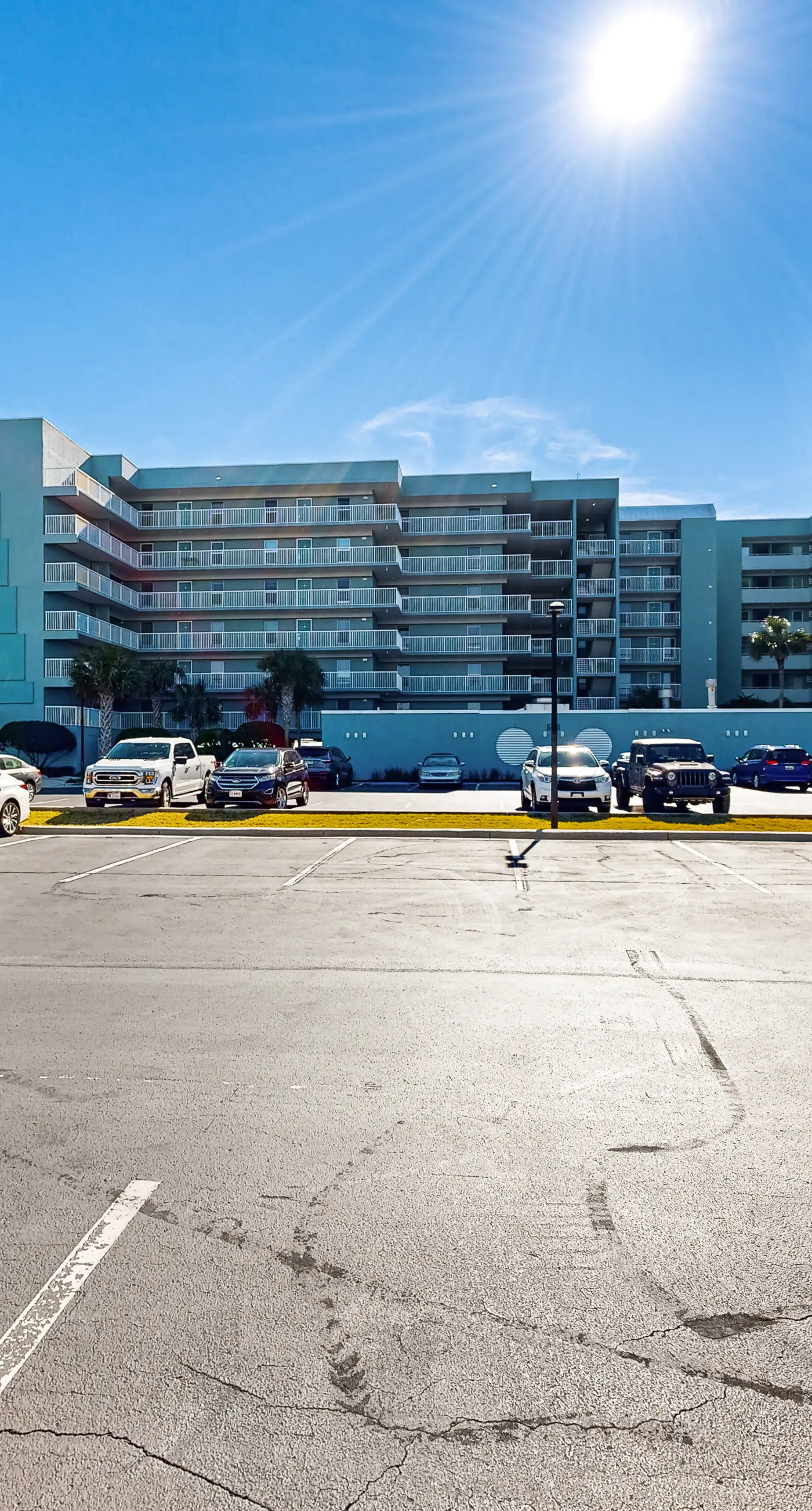 Beachfront condo with gulf views, pool, gym, & private balcony