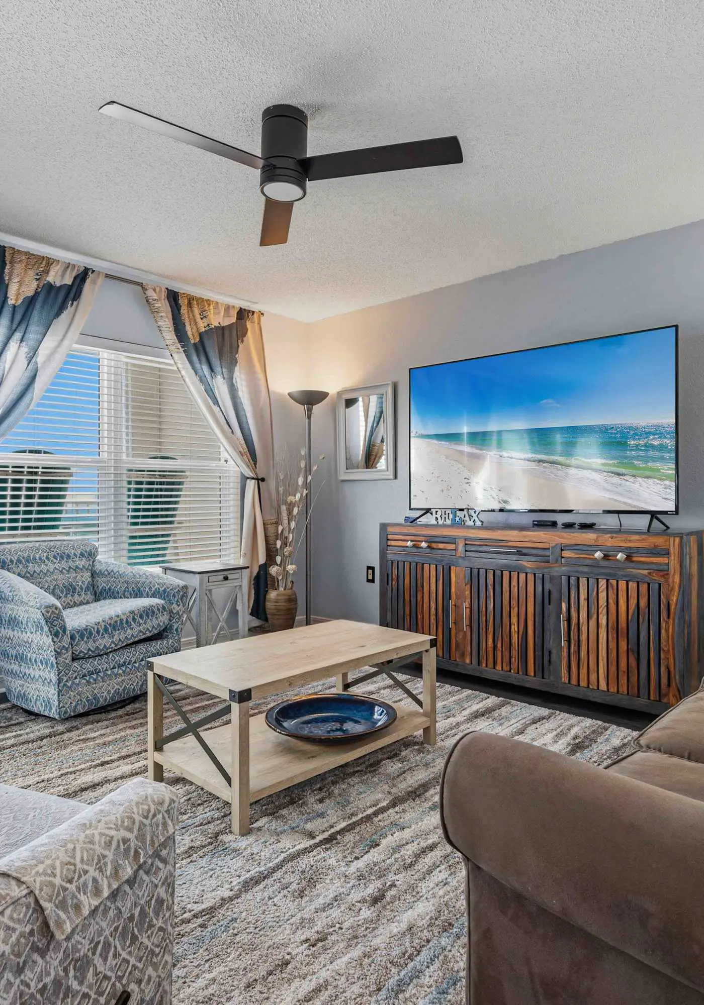Beachfront condo with gulf views, pool, gym, & private balcony