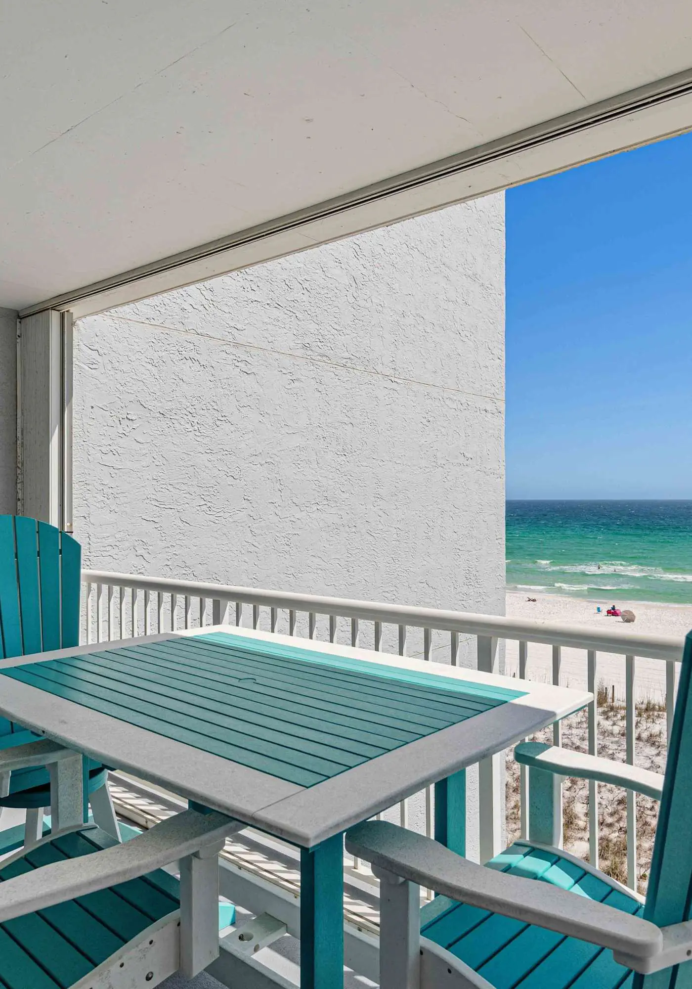 Beachfront condo with gulf views, pool, gym, & private balcony