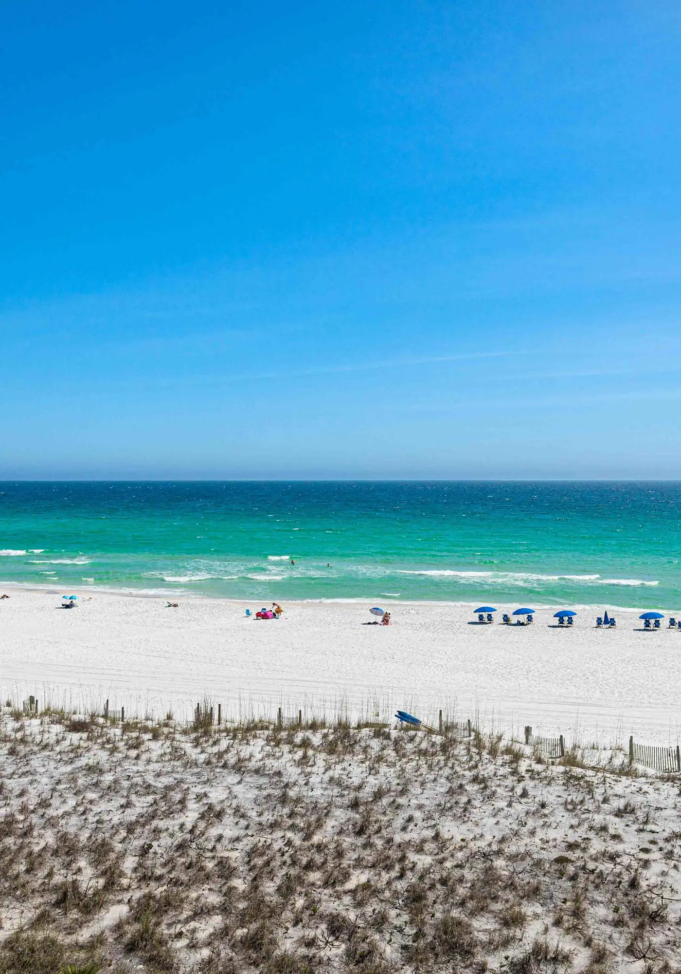 Beachfront condo with gulf views, pool, gym, & private balcony
