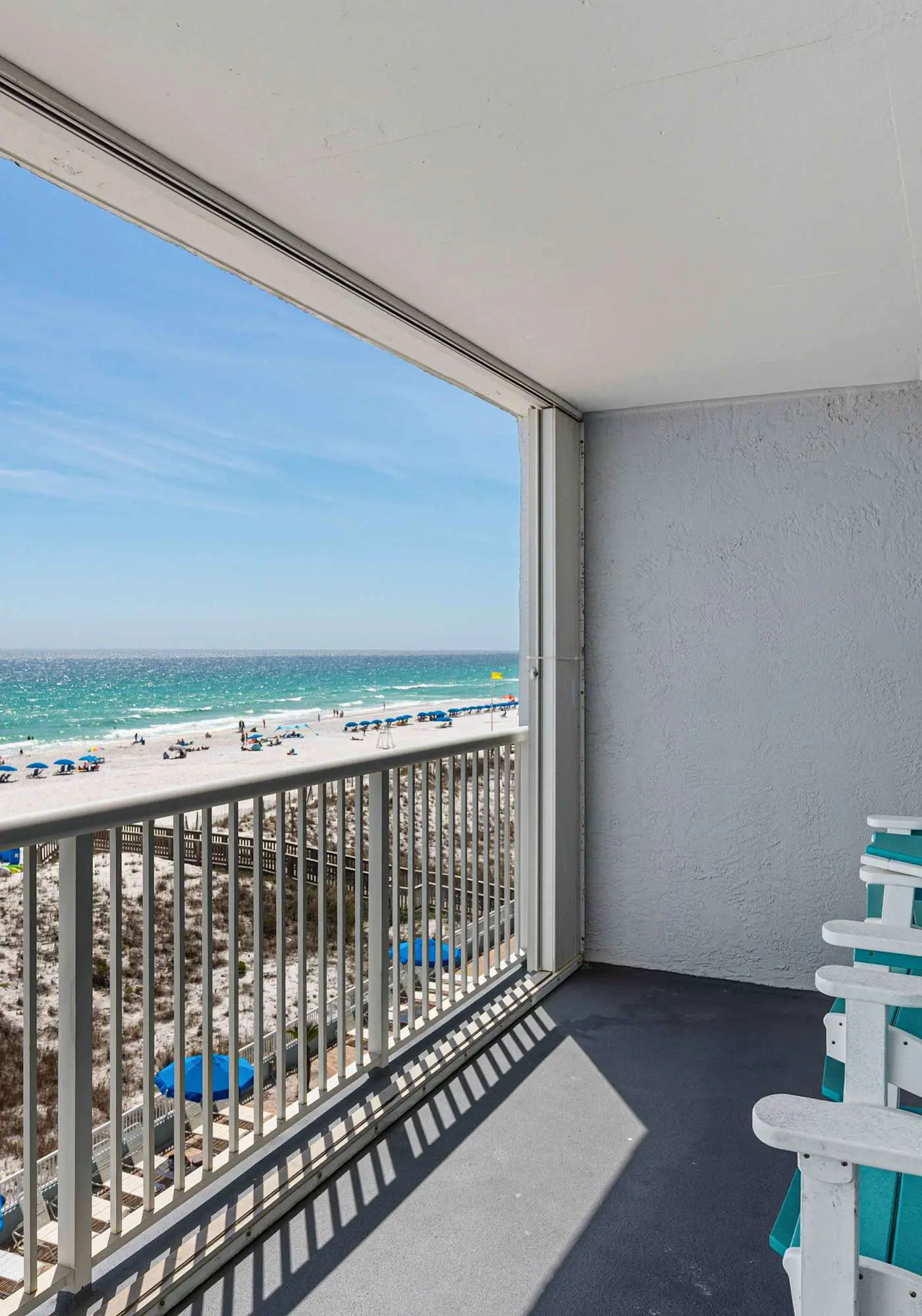 Beachfront condo with gulf views, pool, gym, & private balcony