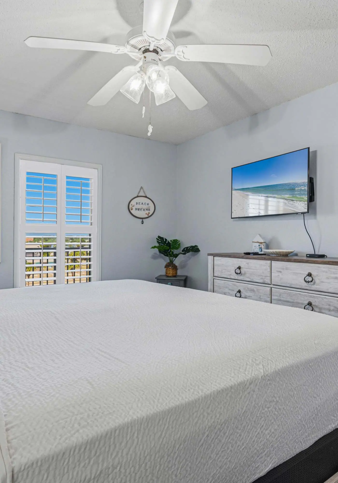 Beachfront condo with gulf views, pool, gym, & private balcony