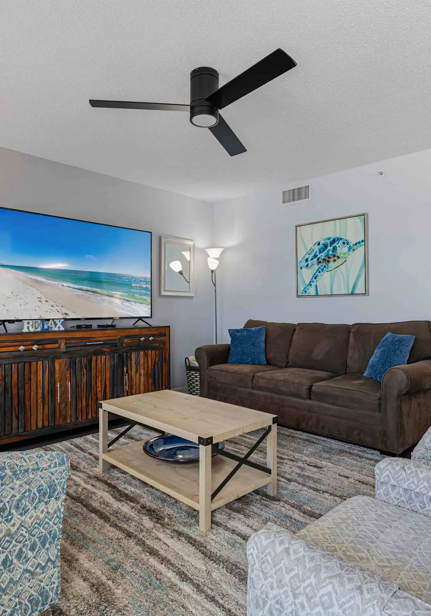 Beachfront condo with gulf views, pool, gym, & private balcony
