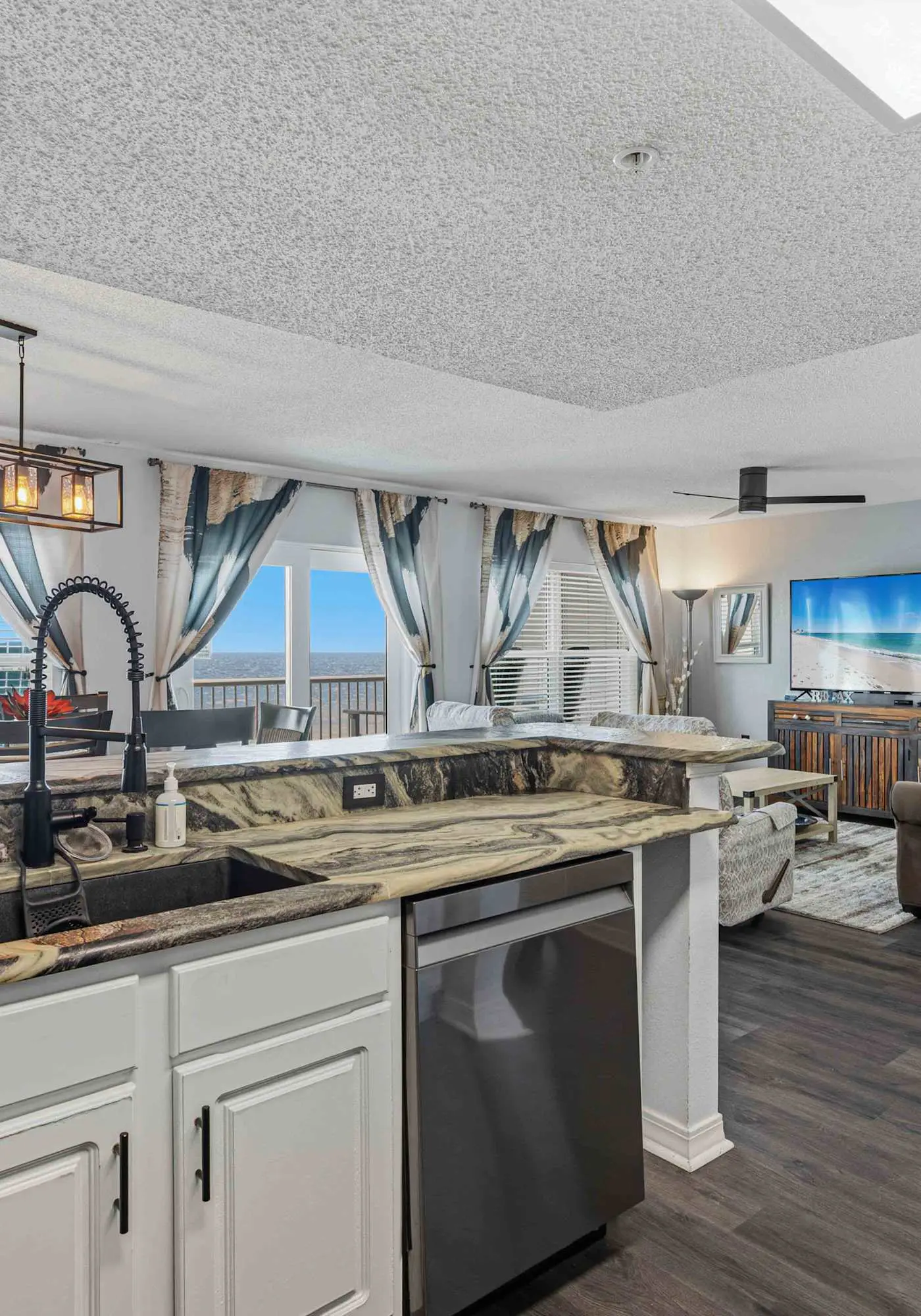 Beachfront condo with gulf views, pool, gym, & private balcony