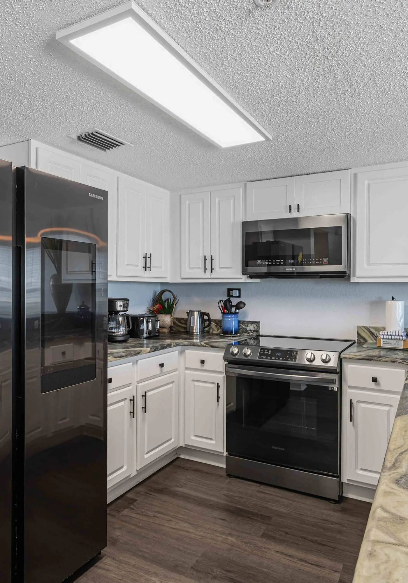 Beachfront condo with gulf views, pool, gym, & private balcony