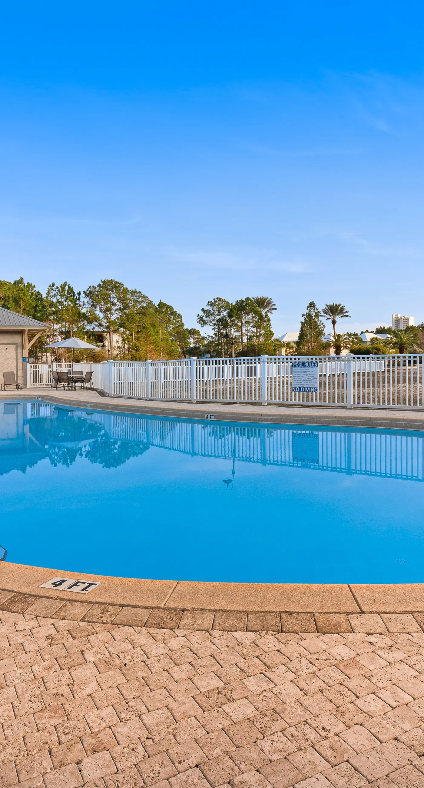 Gorgeous coastal condo with shared pool and private balcony