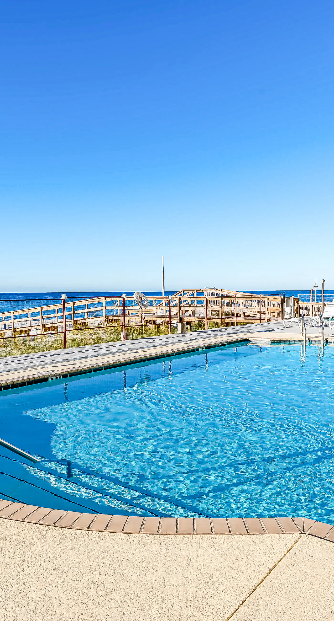 Gulf-front condo with shared pool & gym, balcony, WiFi, & great view