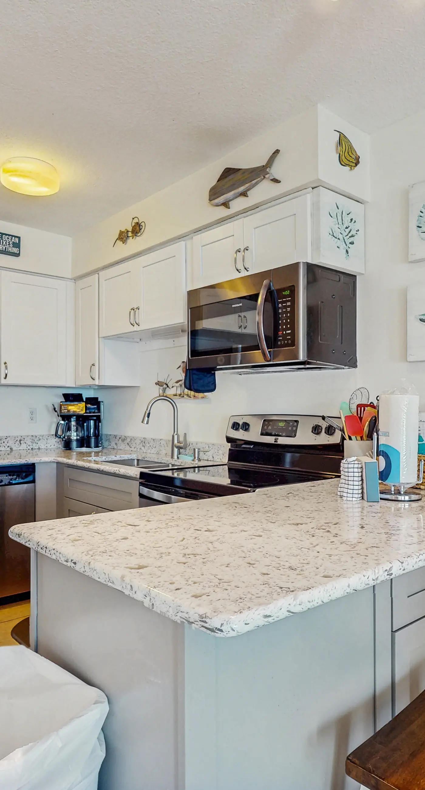Gulf-front condo with shared pool & gym, balcony, WiFi, & great view