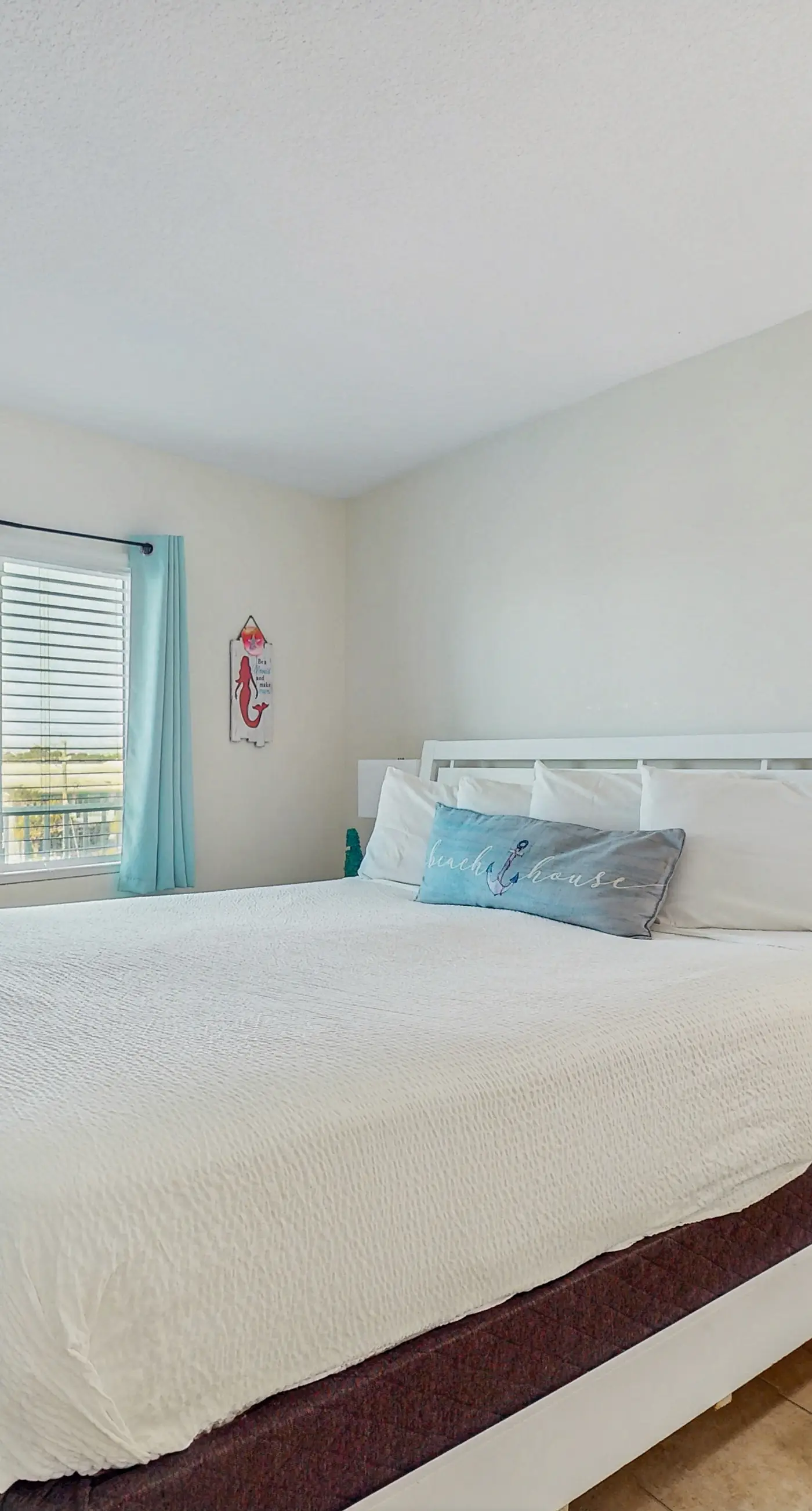 Gulf-front condo with shared pool & gym, balcony, WiFi, & great view