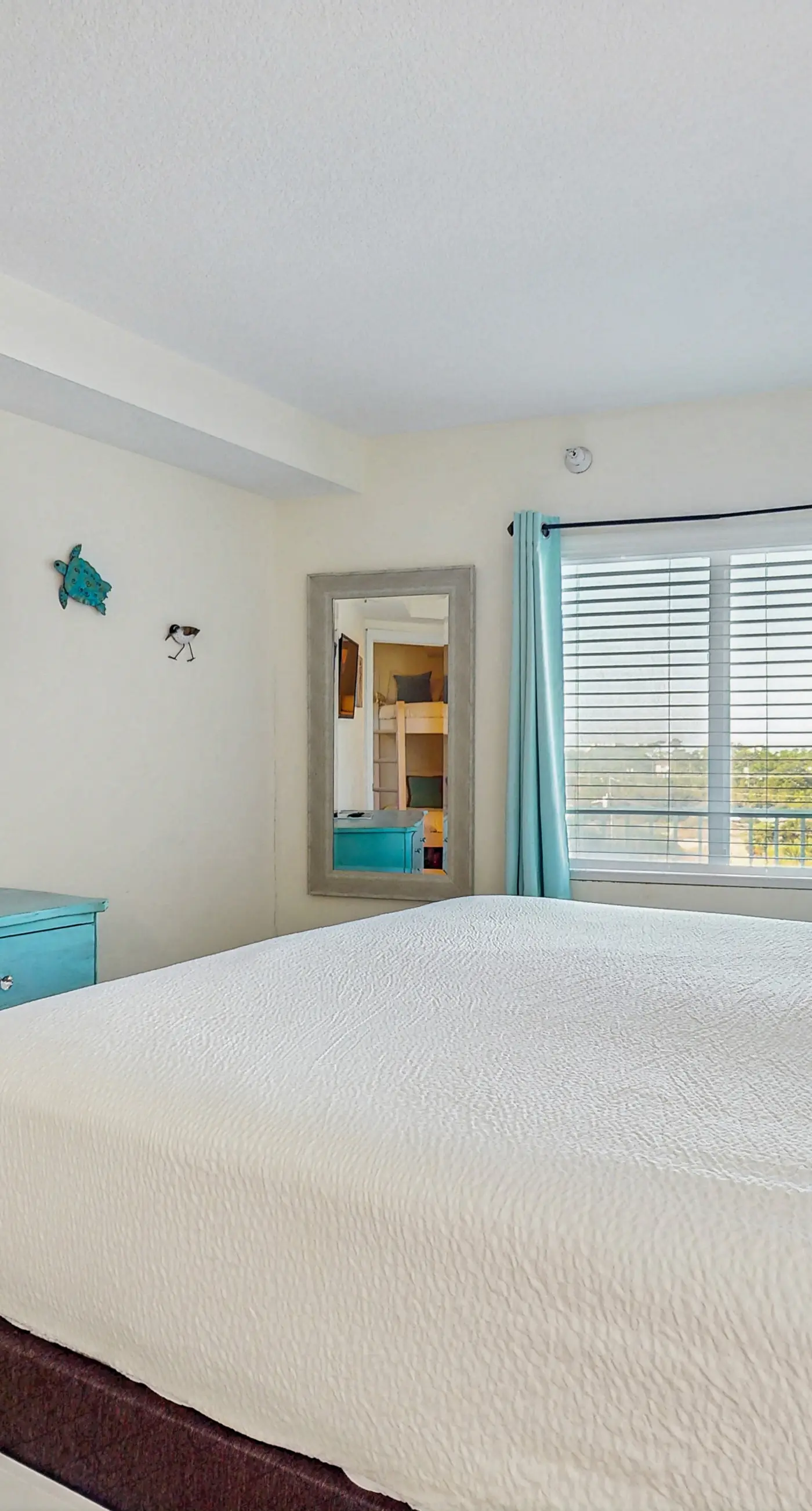 Gulf-front condo with shared pool & gym, balcony, WiFi, & great view
