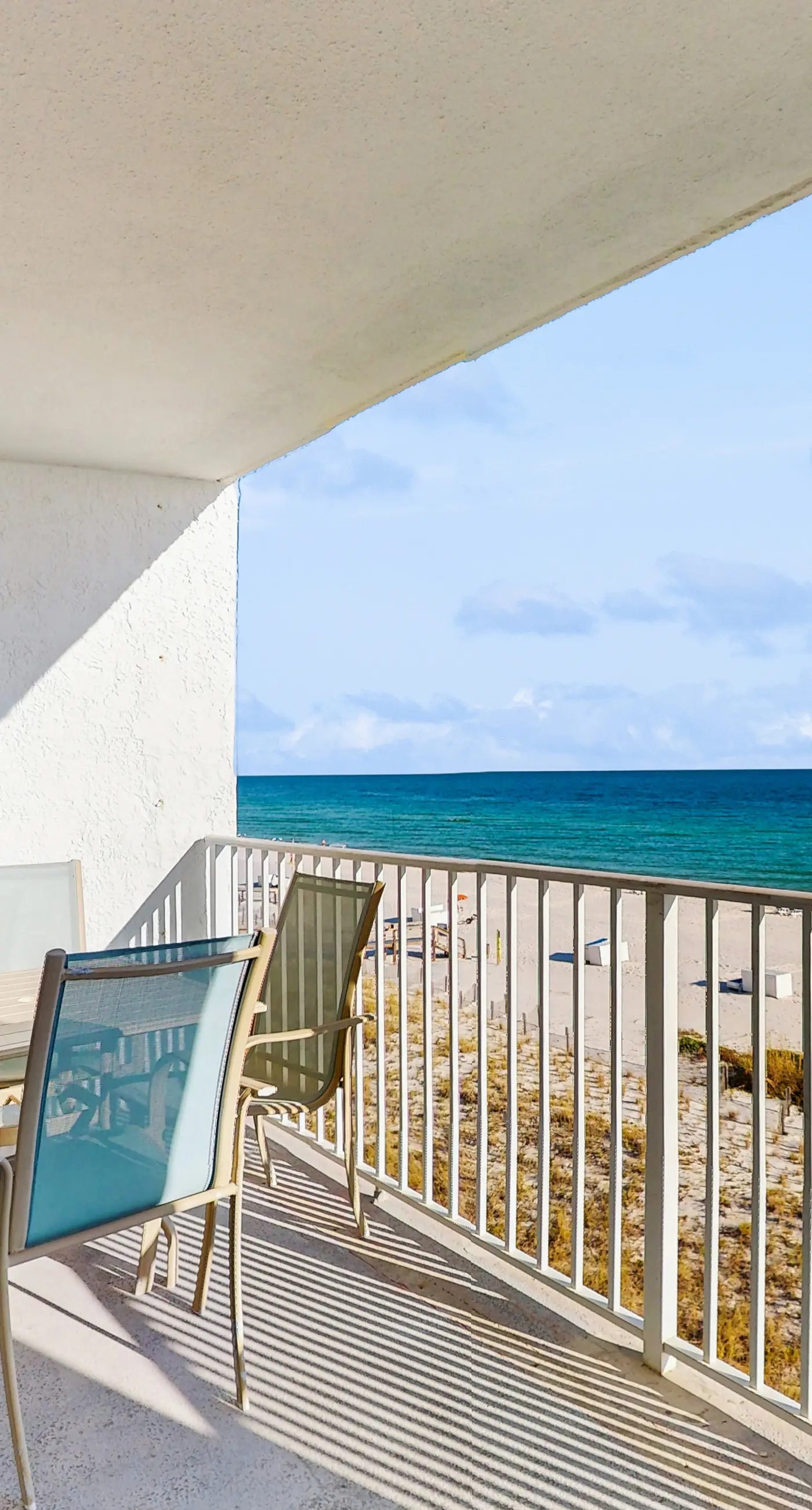 Gulf-front condo with shared pool & gym, balcony, WiFi, & great view
