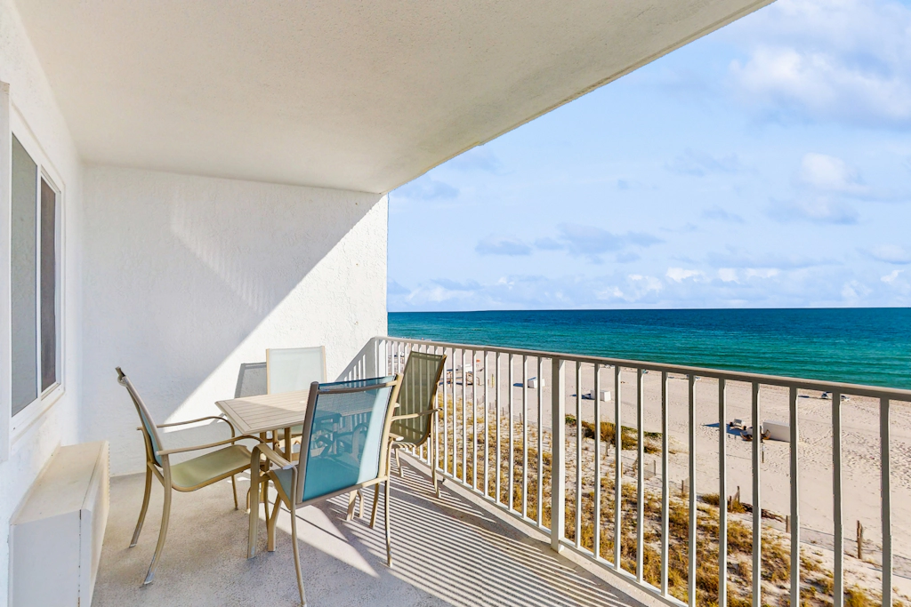 Gulf-front condo with shared pool & gym, balcony, WiFi, & great view