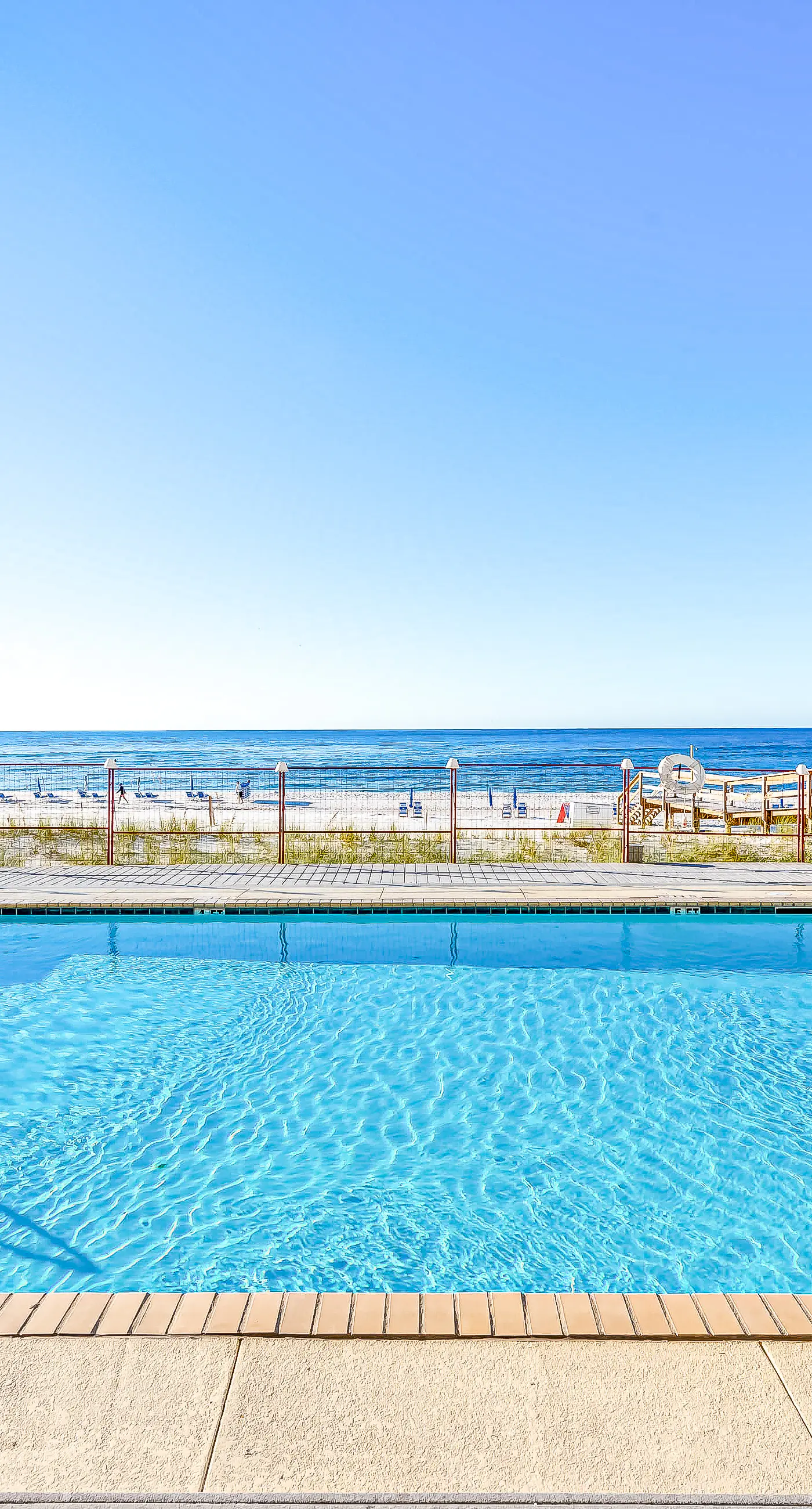 Gulf-front condo with shared pool & gym, balcony, WiFi, & great view