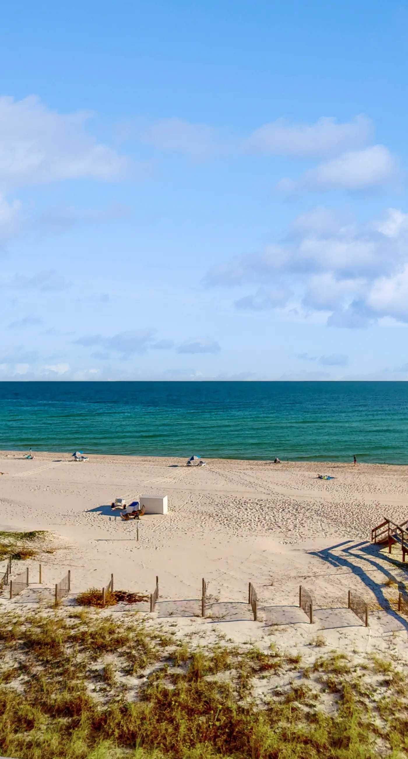 Gulf-front condo with shared pool & gym, balcony, WiFi, & great view