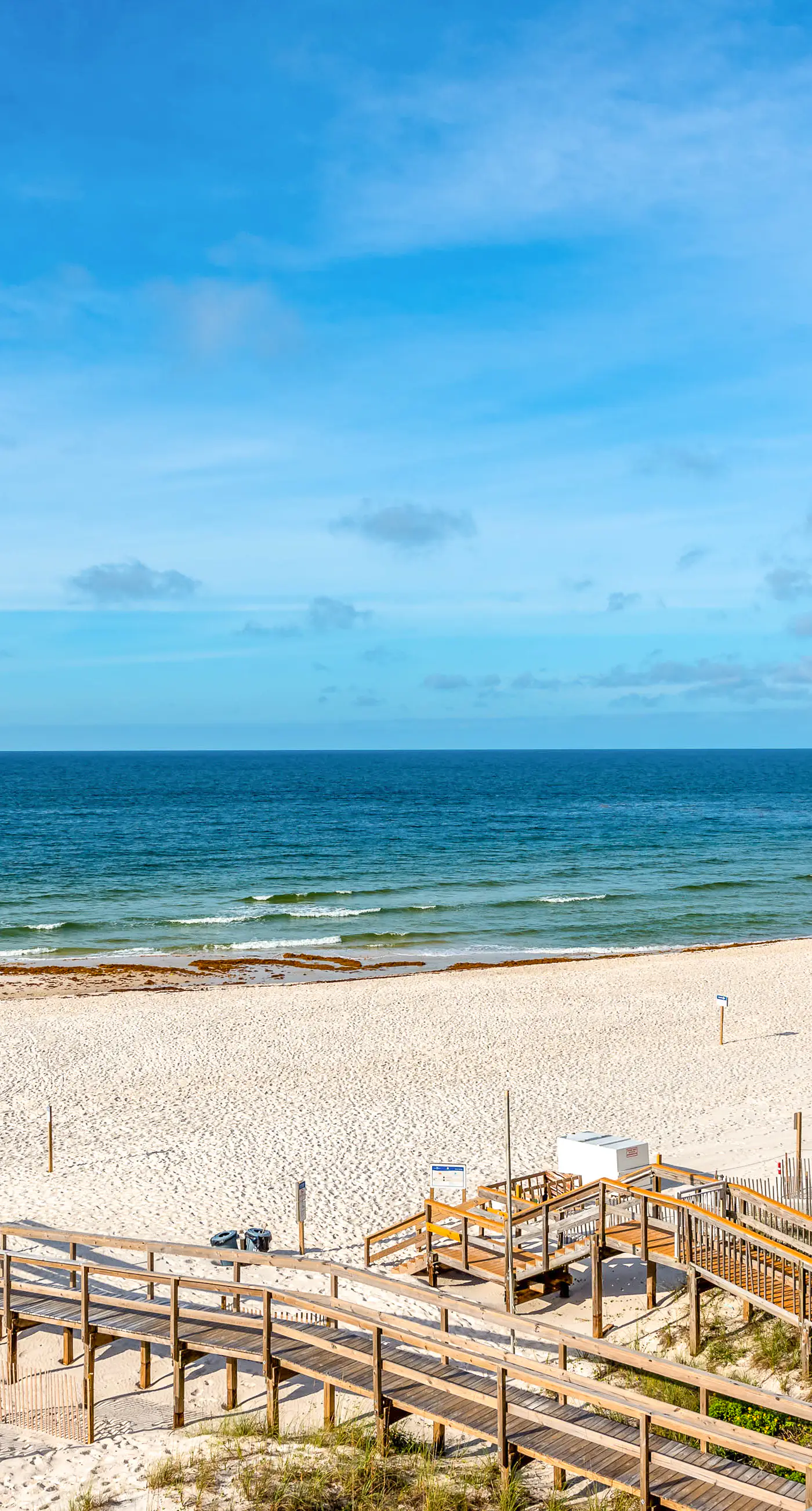 Gulf-front condo with shared pool & gym, balcony, WiFi, & great view