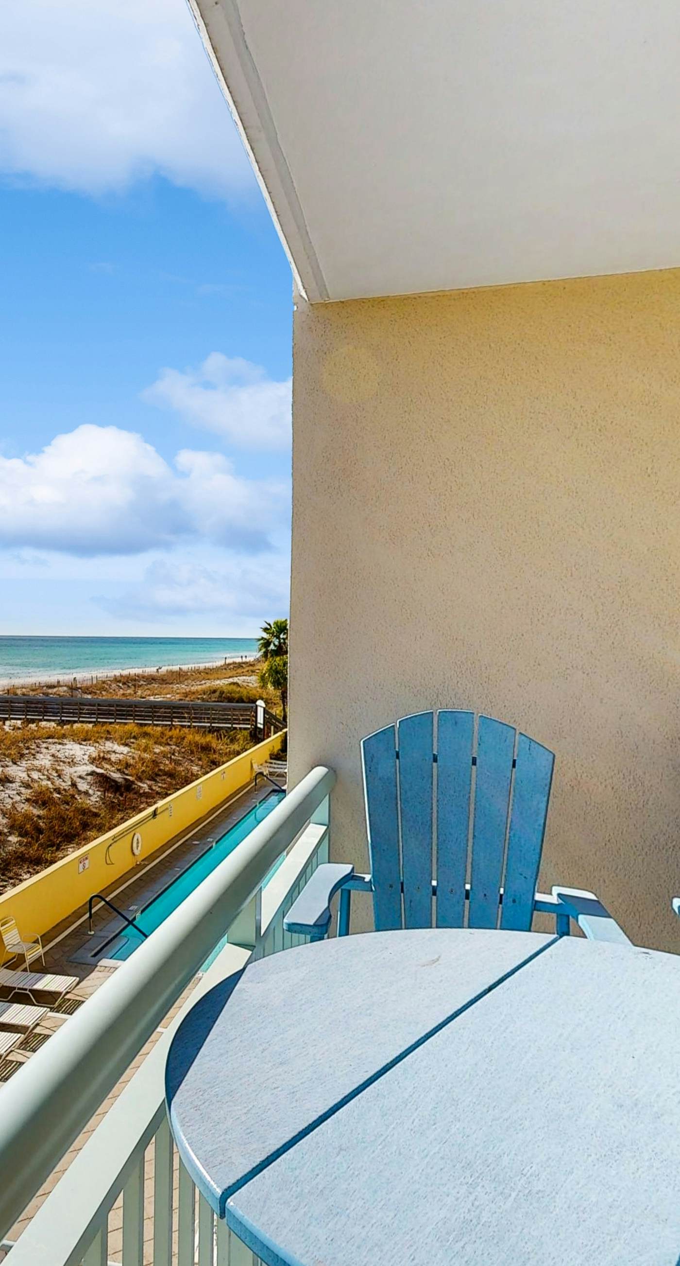 Pelican Isle 209-Stylish beach getaway with shared pool, private balcony, gulf views & fast WiFi