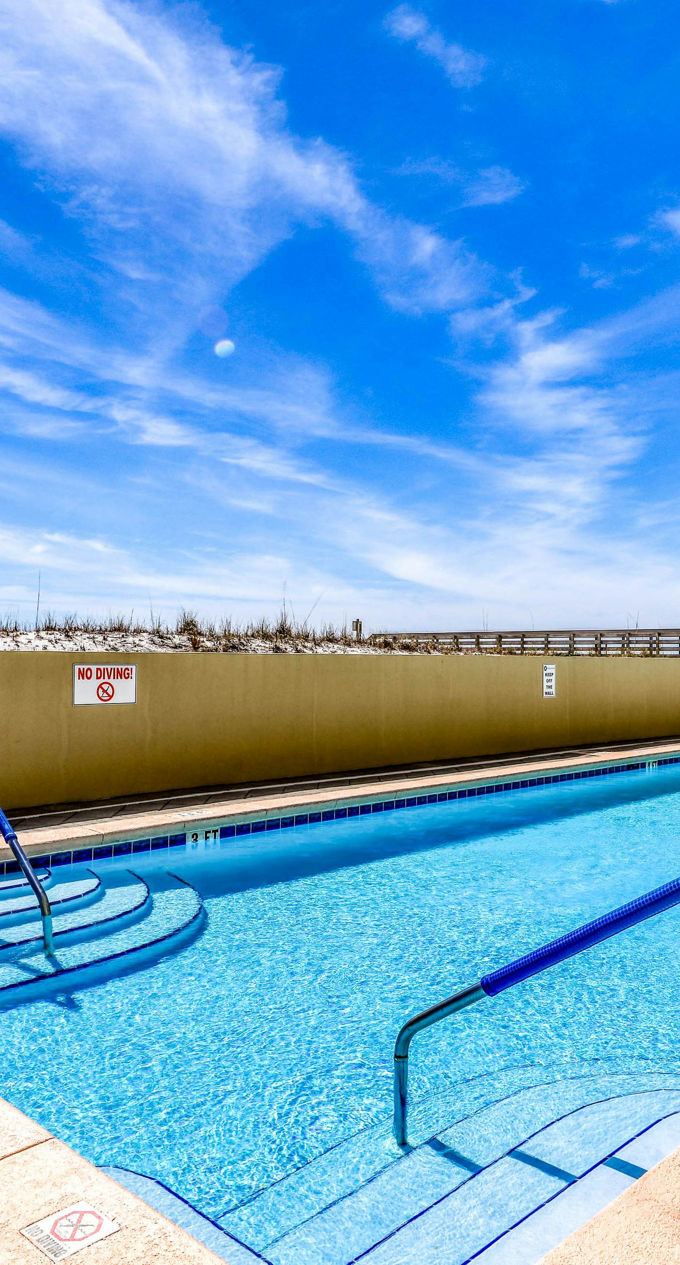 Pelican Isle 209-Stylish beach getaway with shared pool, private balcony, gulf views & fast WiFi