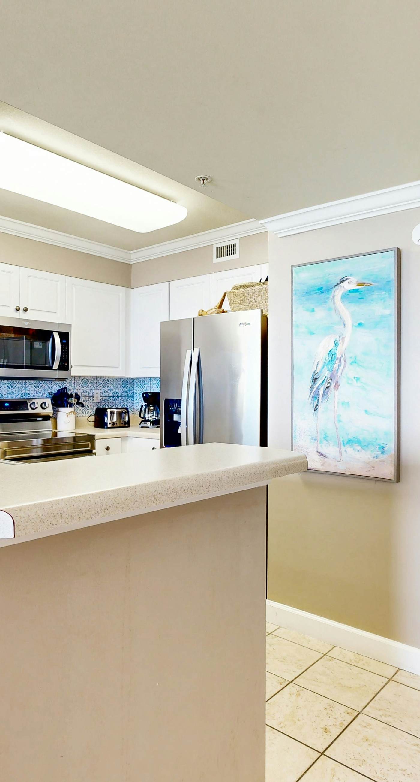 Pelican Isle 209-Stylish beach getaway with shared pool, private balcony, gulf views & fast WiFi