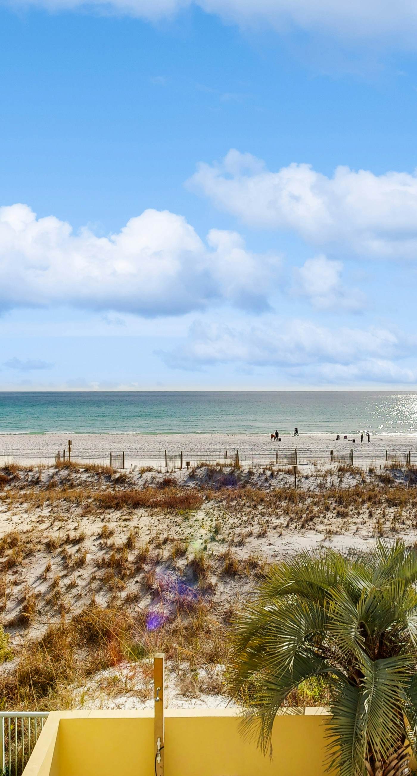 Pelican Isle 209-Stylish beach getaway with shared pool, private balcony, gulf views & fast WiFi