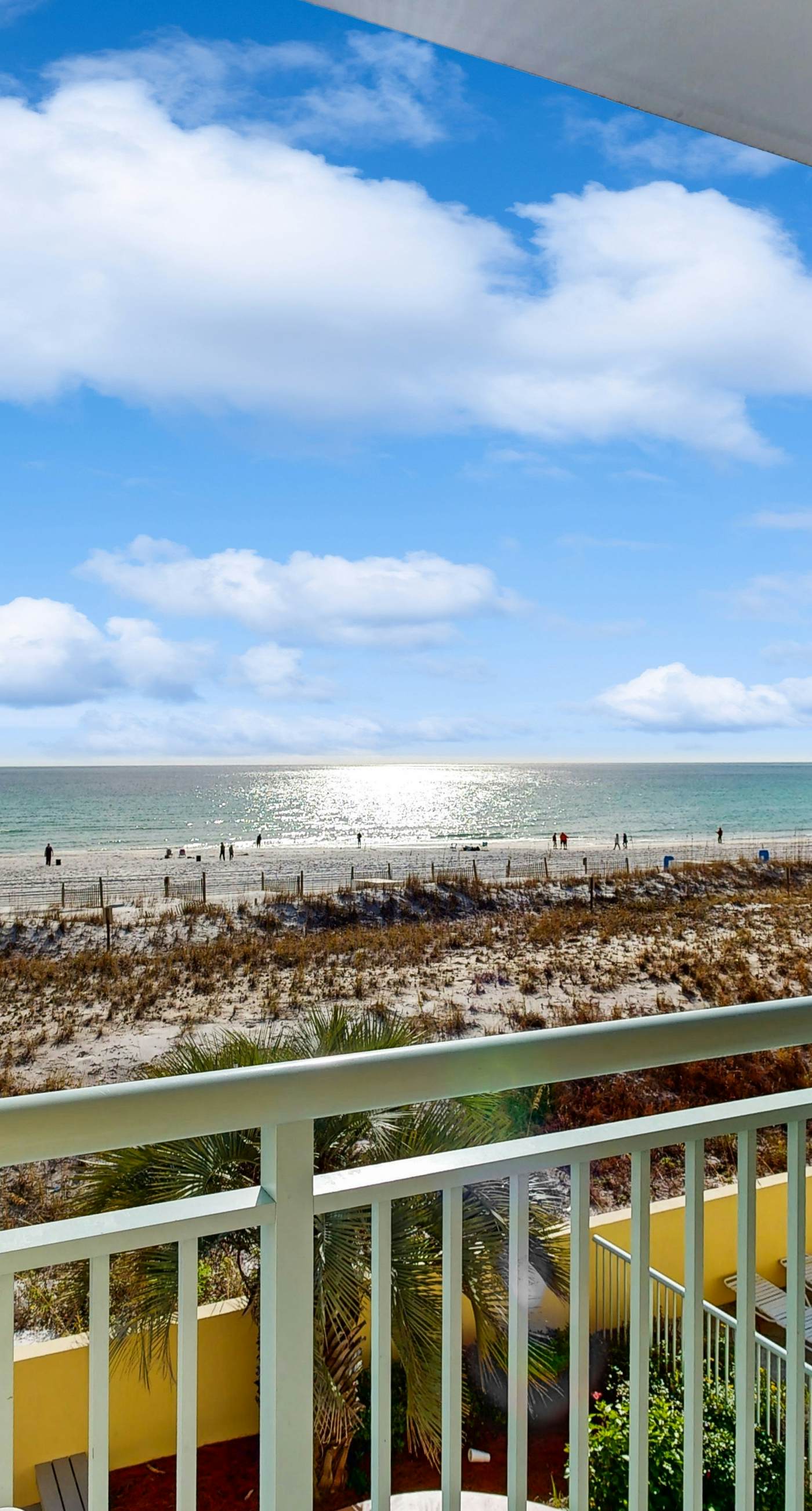 Pelican Isle 209-Stylish beach getaway with shared pool, private balcony, gulf views & fast WiFi