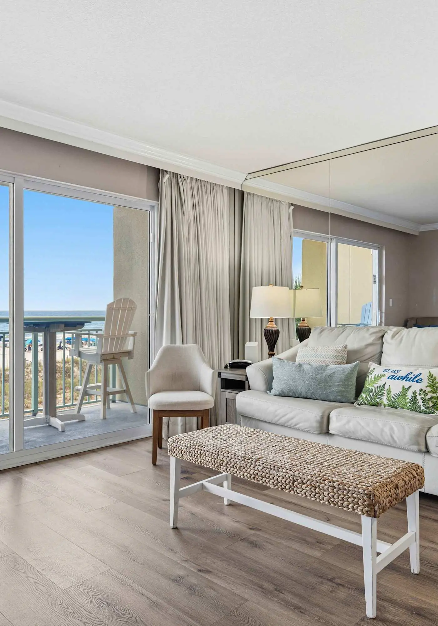 Stylish beach getaway with shared pool, private balcony, gulf views & fast WiFi