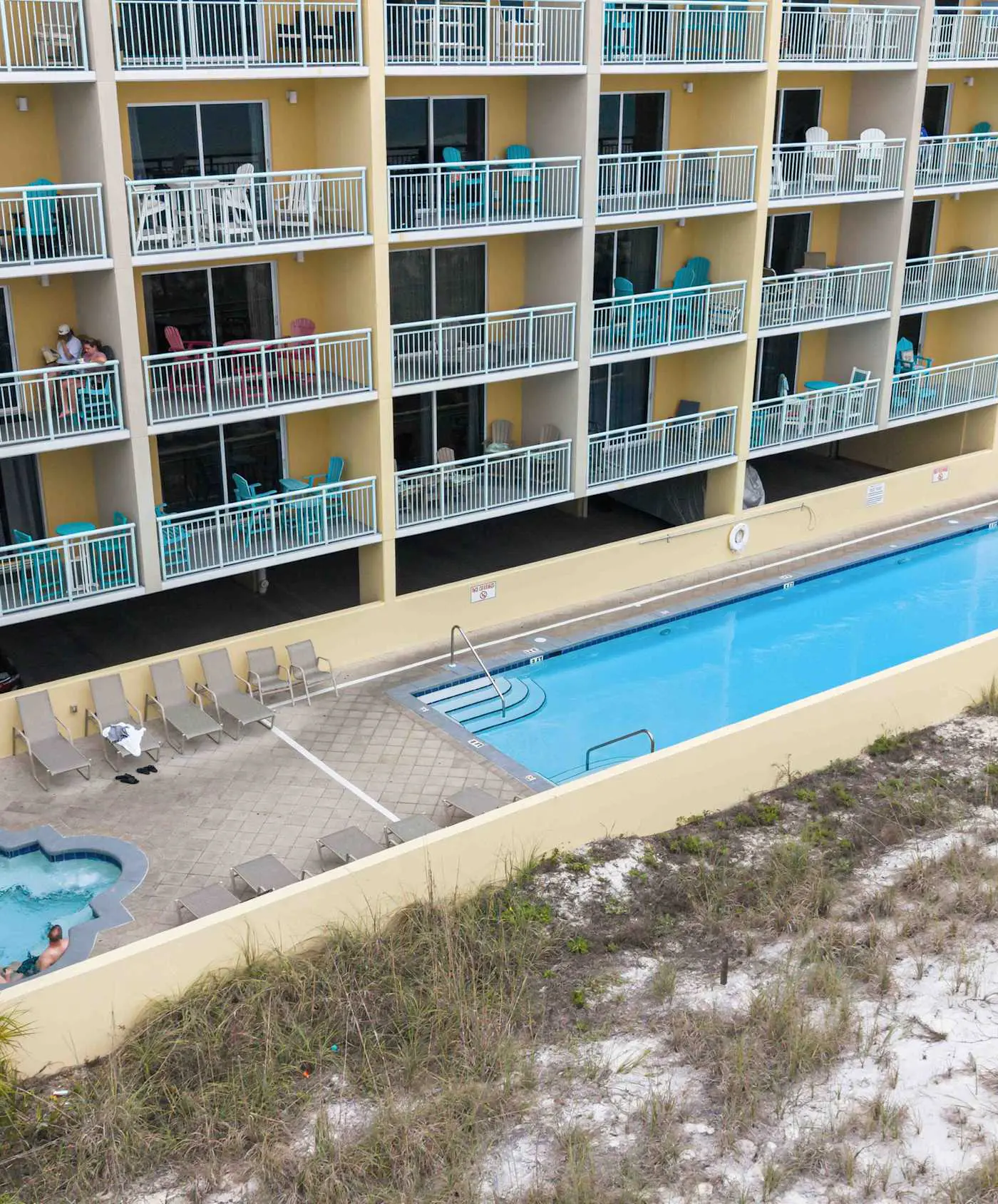 Stylish beach getaway with shared pool, private balcony, gulf views & fast WiFi