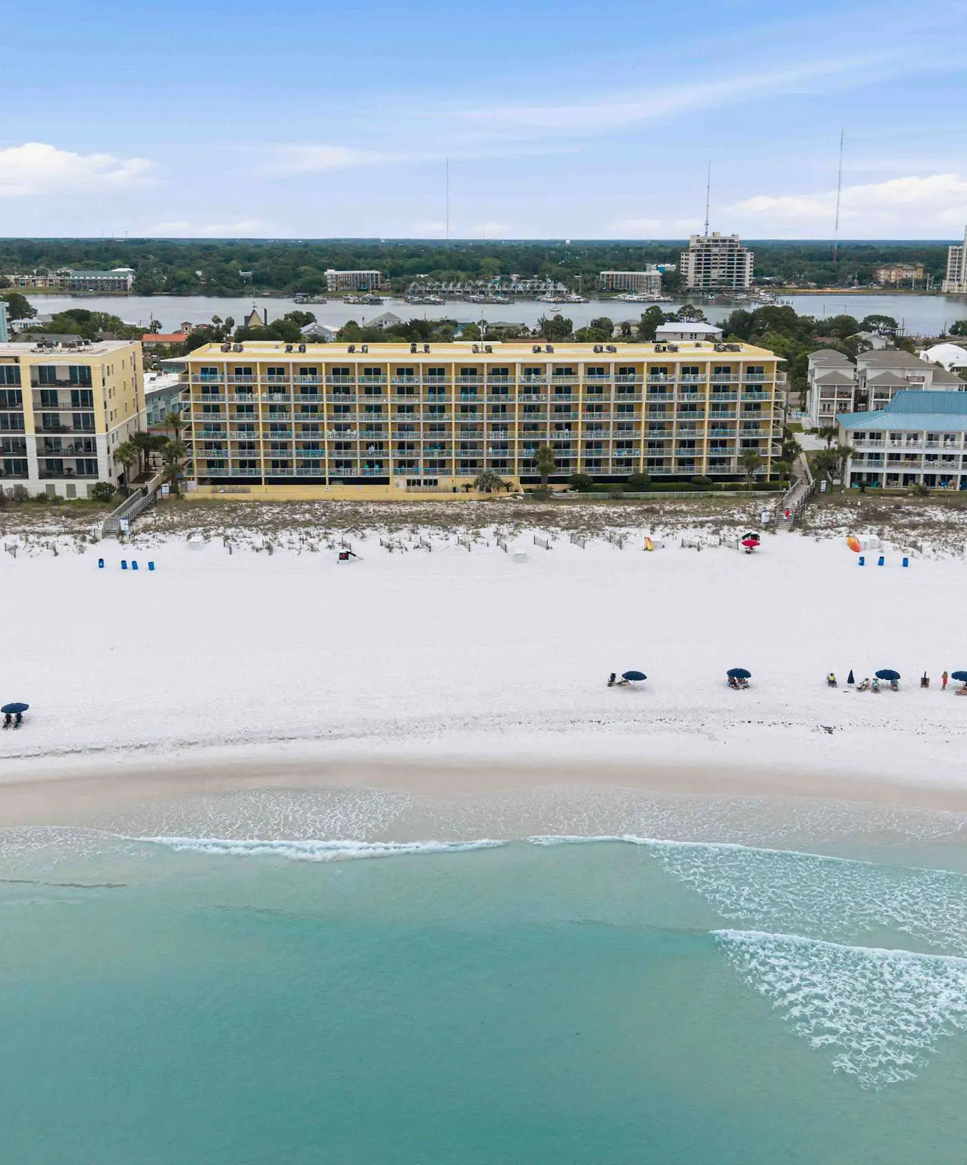 Stylish beach getaway with shared pool, private balcony, gulf views & fast WiFi